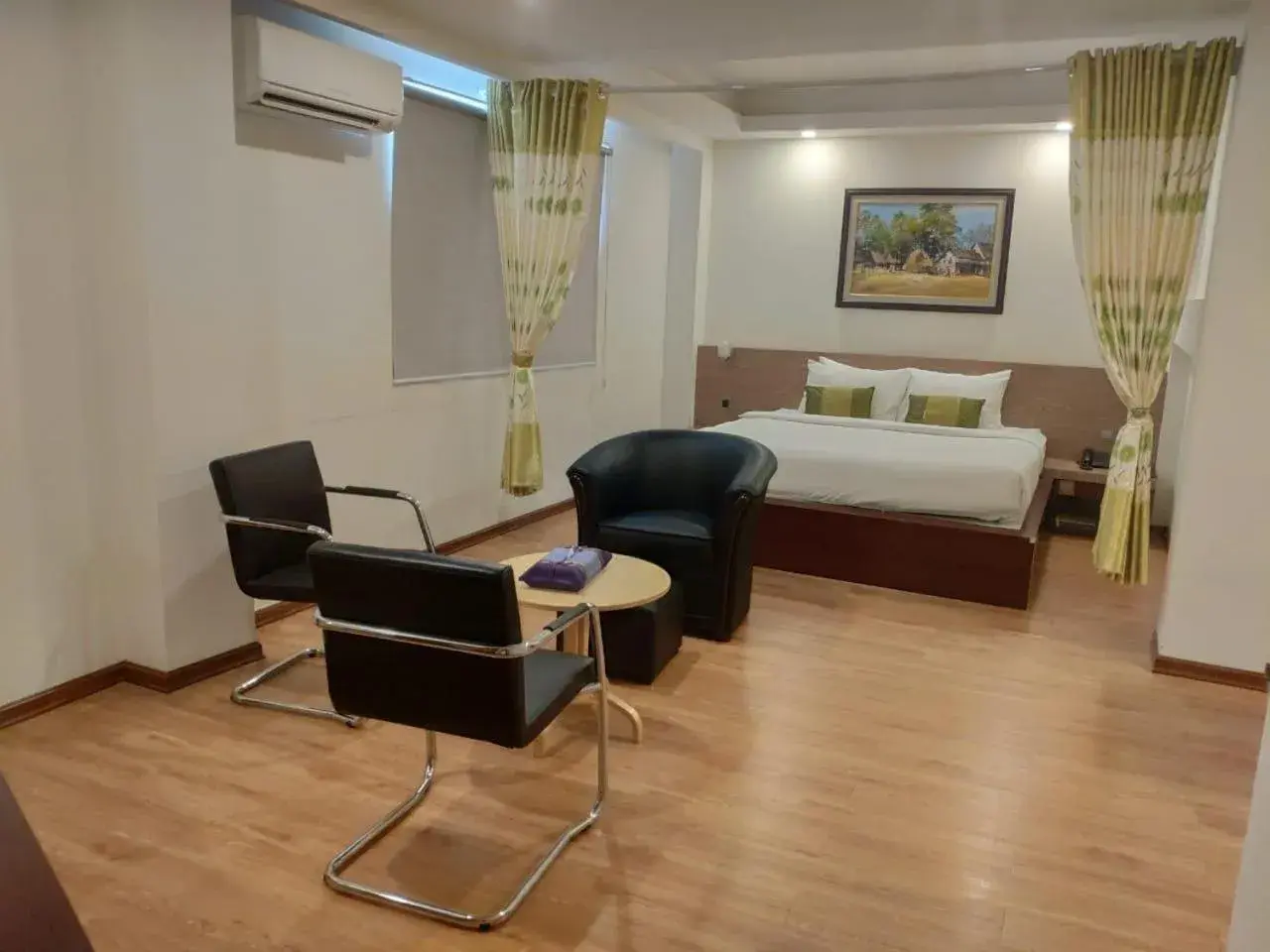 Seating area, Bed in Serene Valley Hotel Seating area, Bed in Serene Valley Hotel