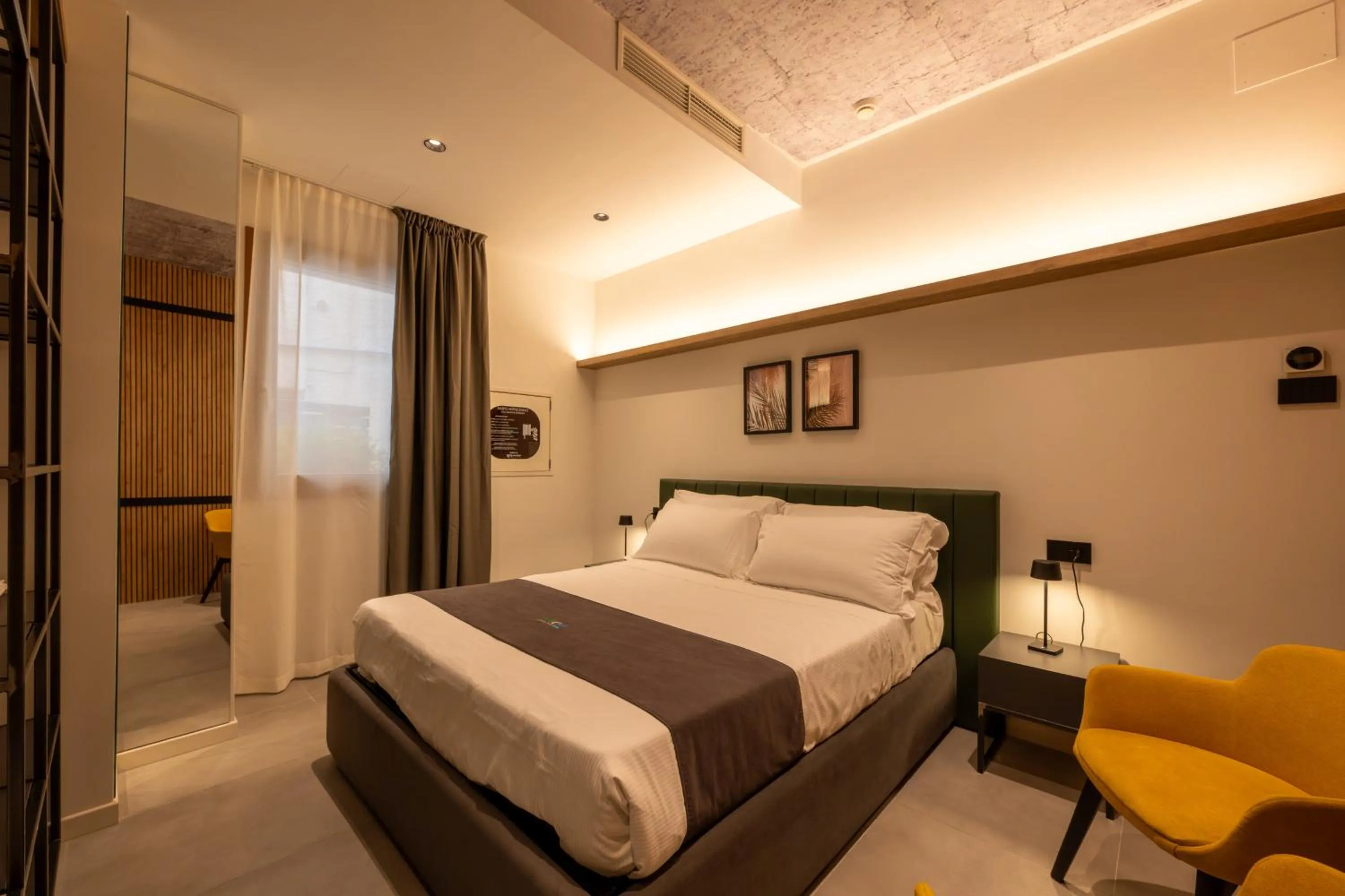 Bed in Meg Lifestyle Hotel & Apartaments