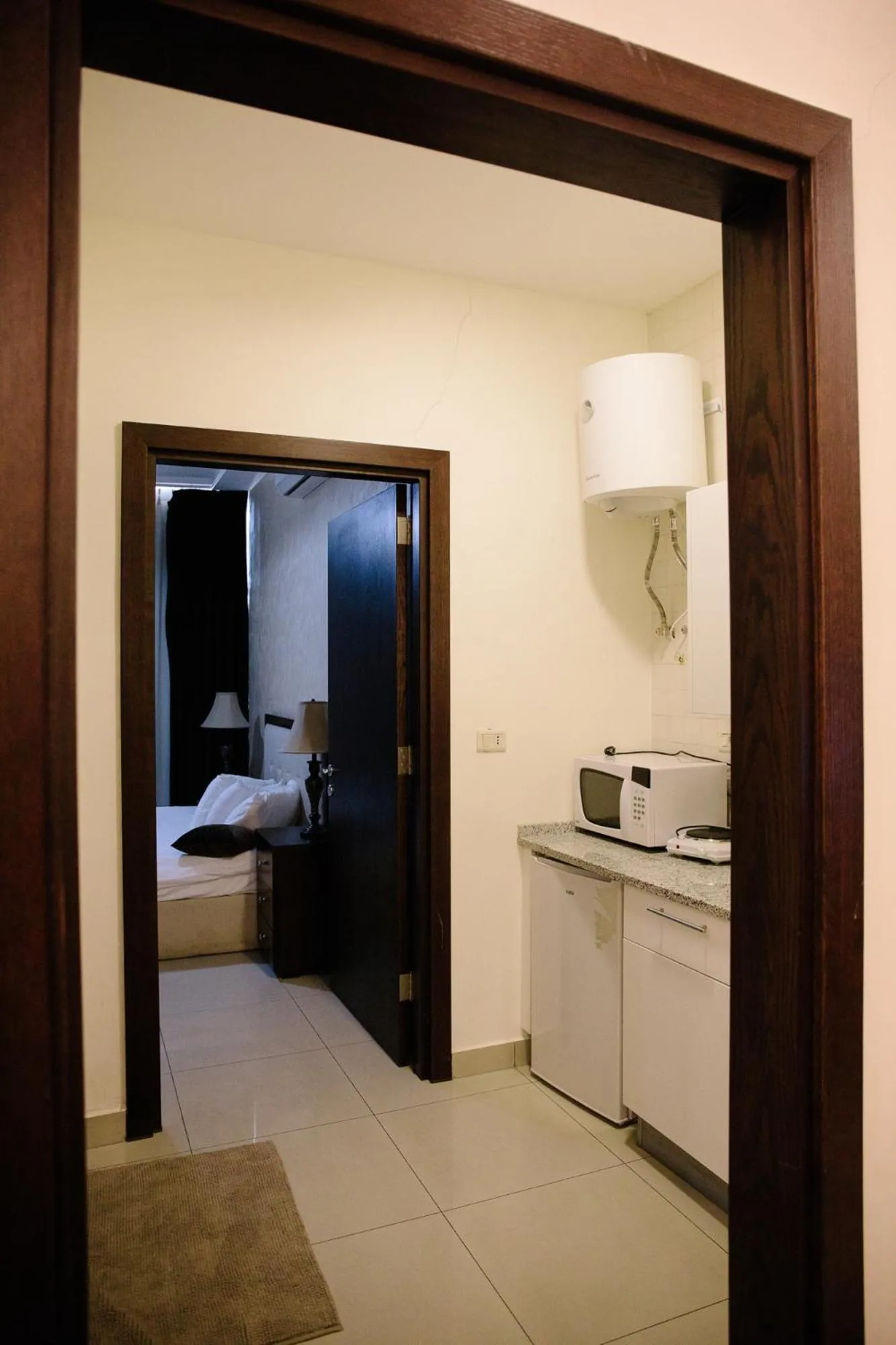 Coffee/tea facilities, Bed in Madina Suites