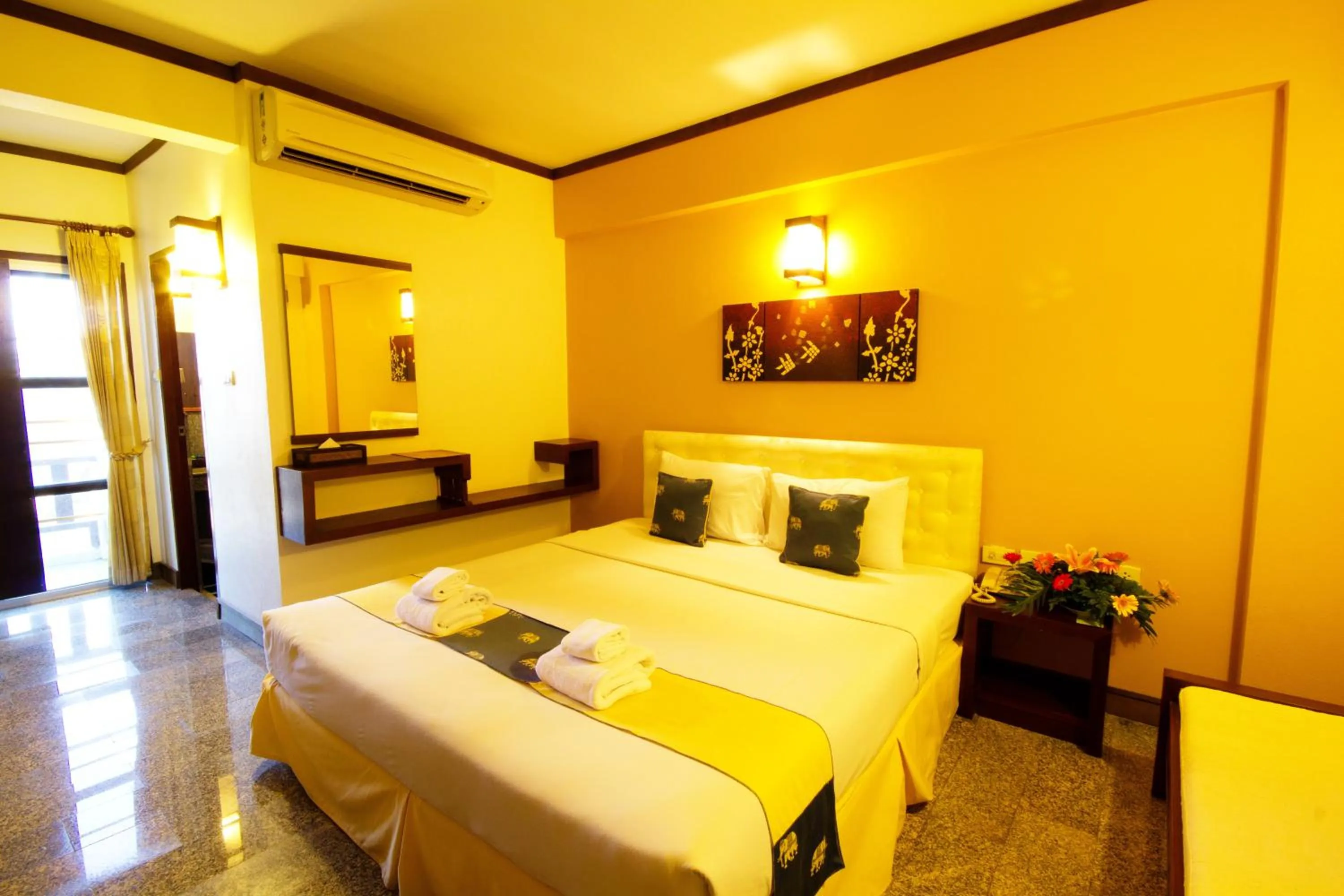 Bed in Rainforest ChiangMai Hotel