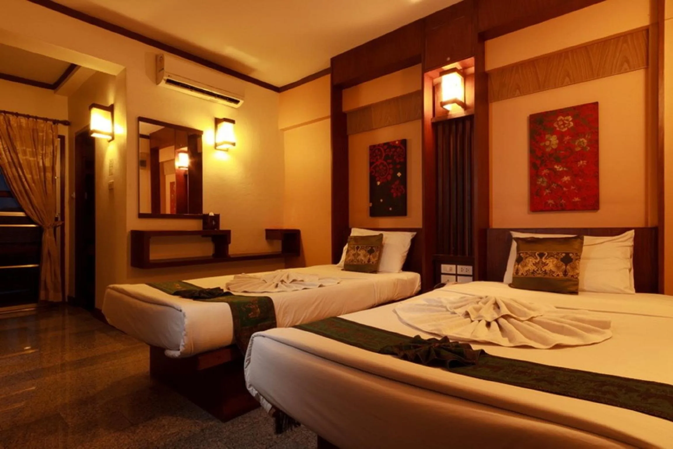 Bed in Rainforest ChiangMai Hotel