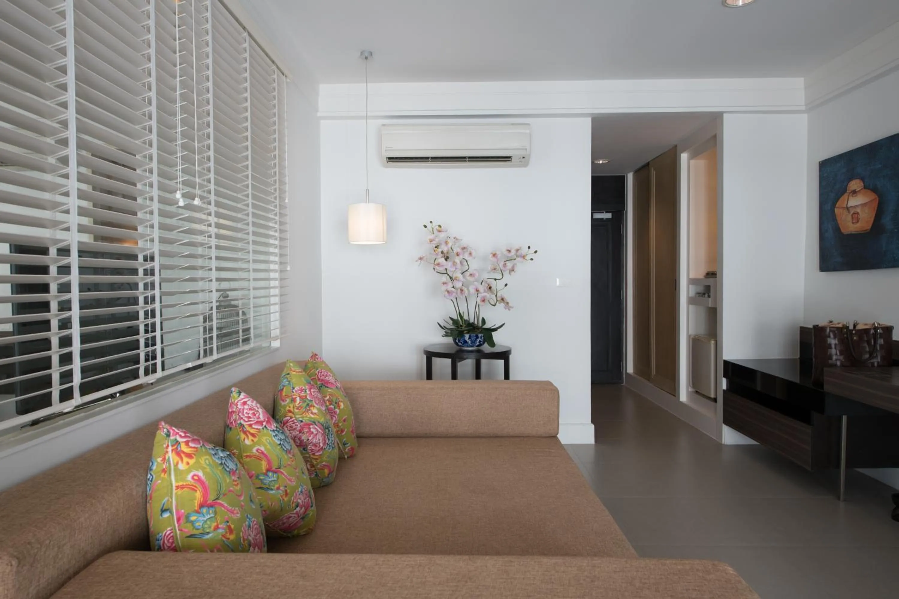 Seating area in Sawaddi Patong Resort & Spa by Tolani