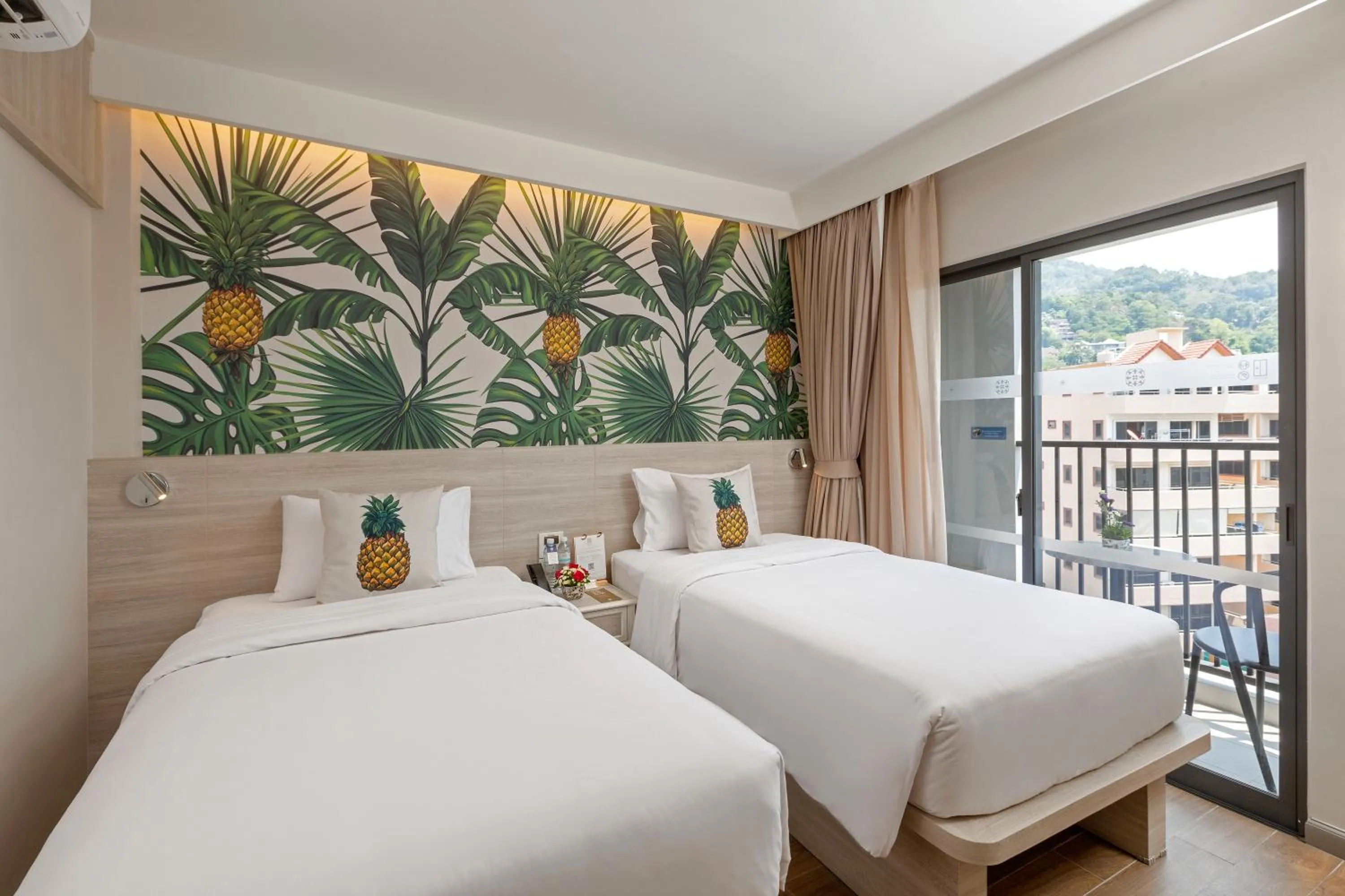 Bed in Sawaddi Patong Resort & Spa by Tolani