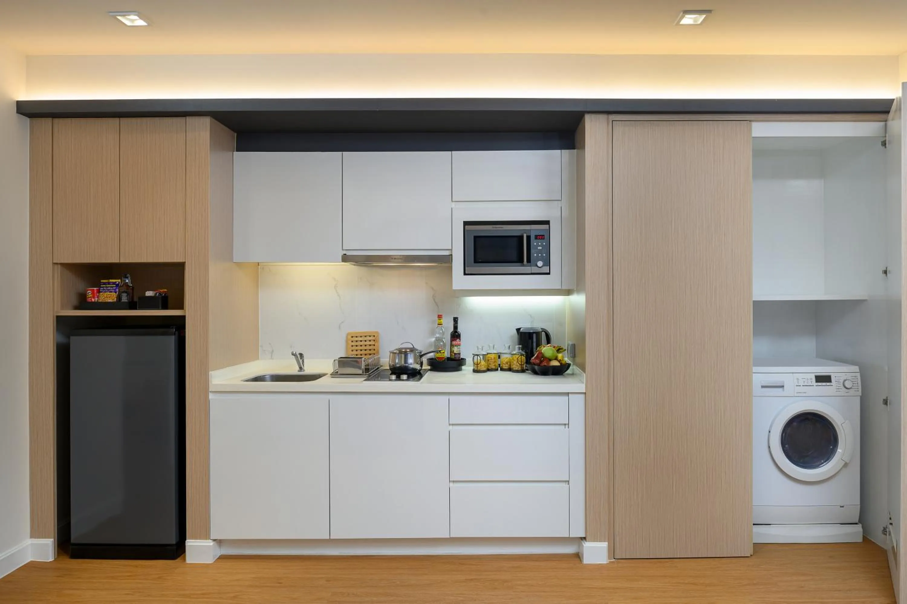 Kitchen or kitchenette in PARKROYAL Suites Bangkok