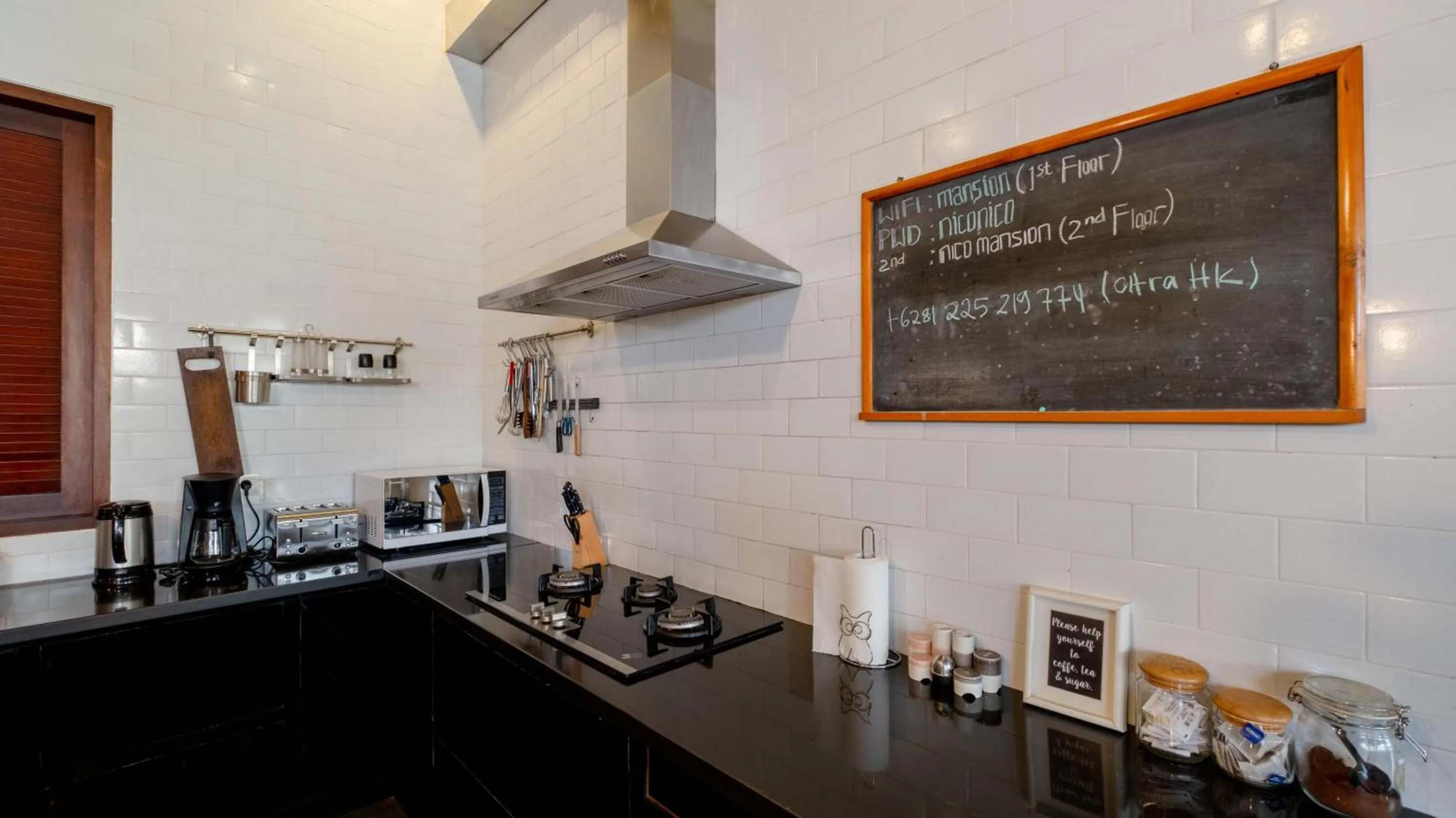 Kitchen or kitchenette in NicoNico Mansion by Villa Finder