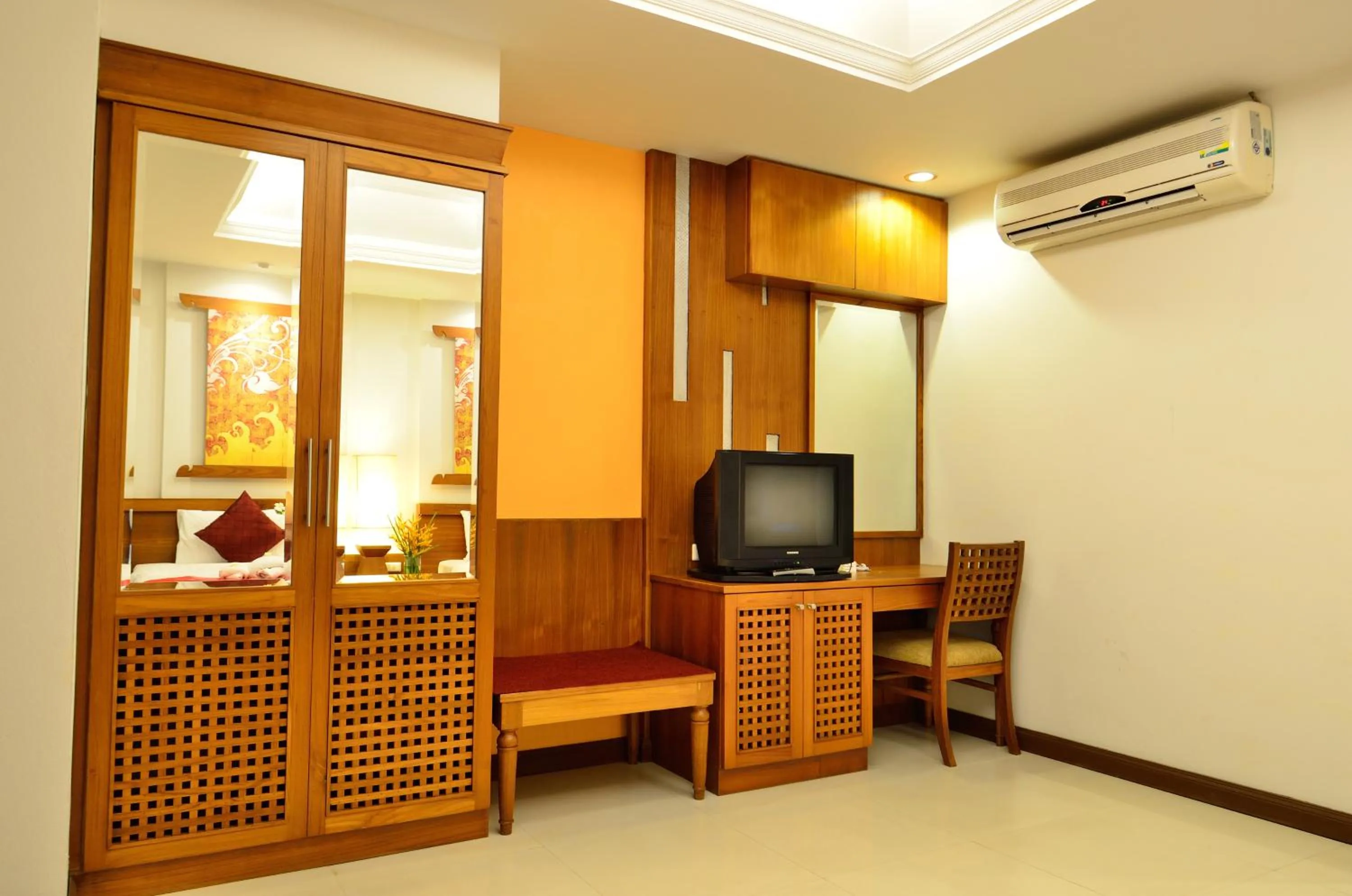 TV and multimedia in First Bungalow Beach Resort