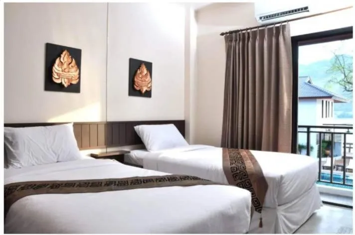 Bed in Monsane River Kwai Resort