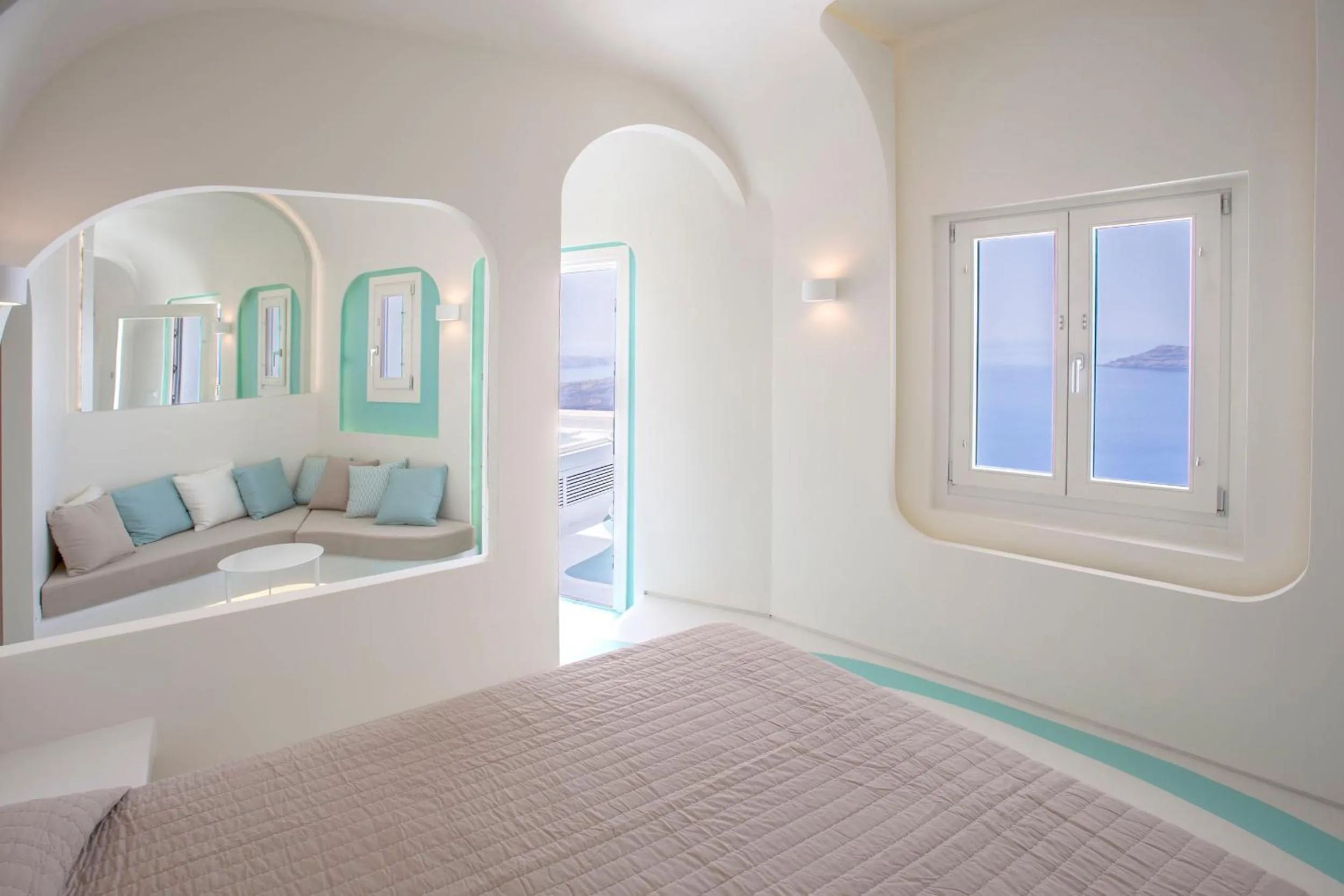 Seating area, Bed in Andronikos Santorini