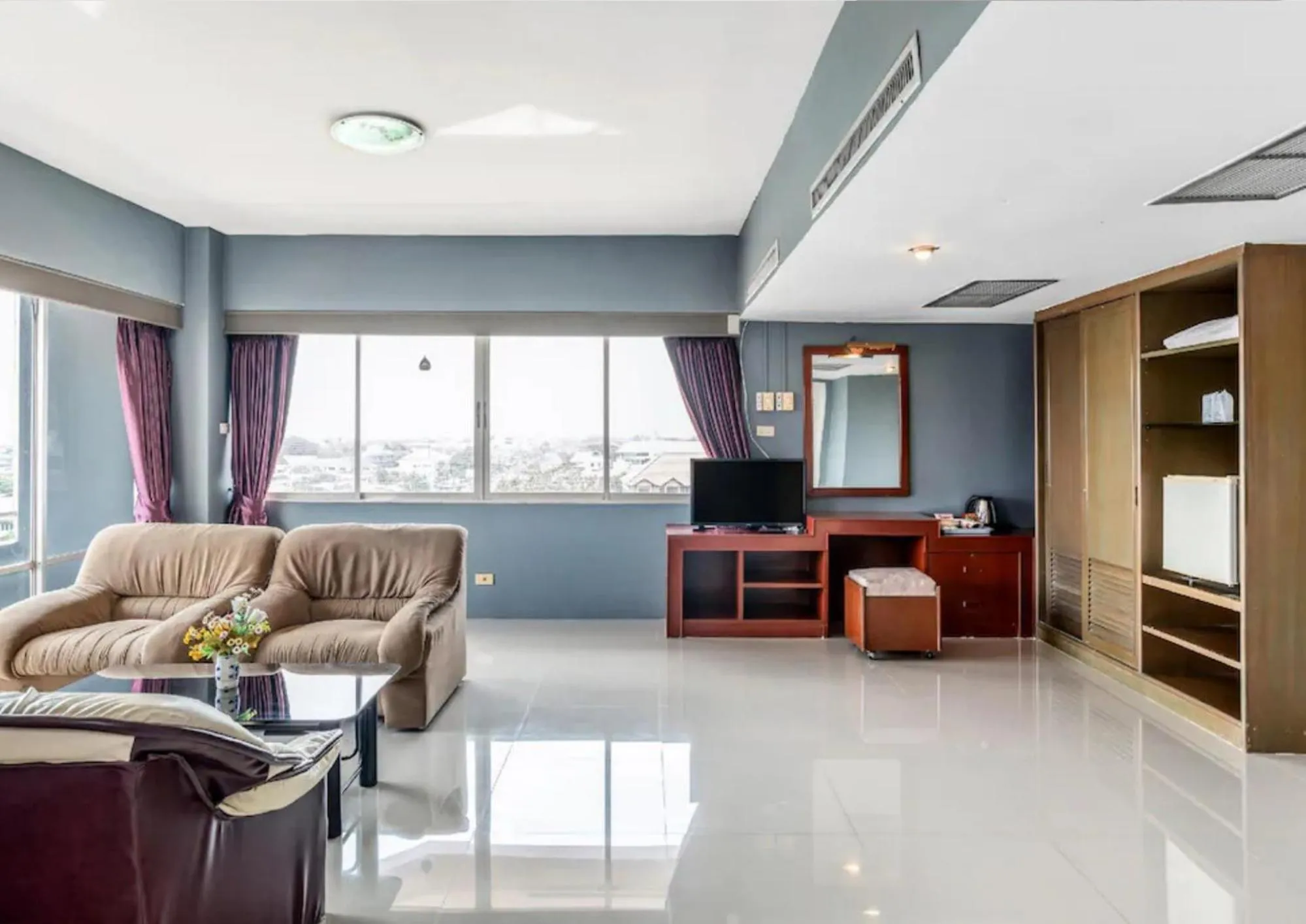 Living room in Ayothaya Riverside Hotel