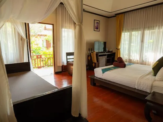 Bed in Kanok Buri Resort