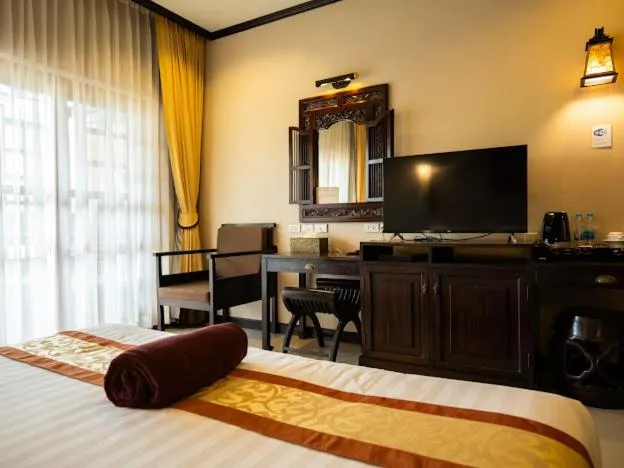 Bed in Kanok Buri Resort