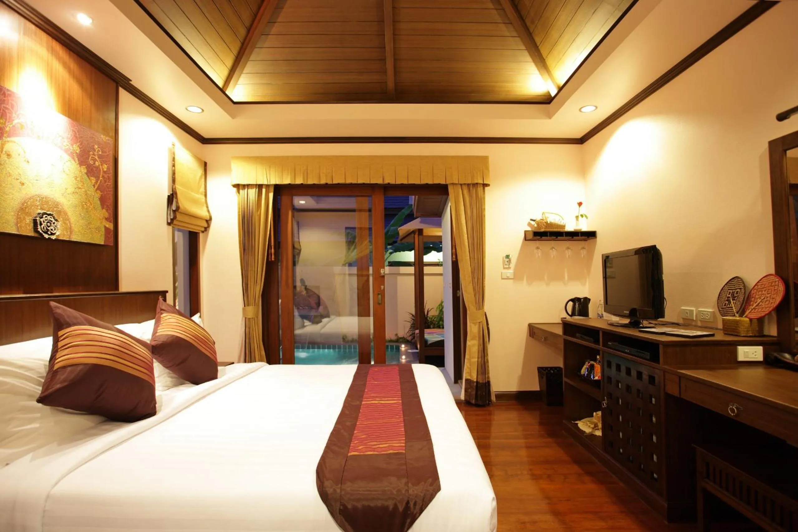 Photo of the whole room, Bed in Kanok Buri Resort