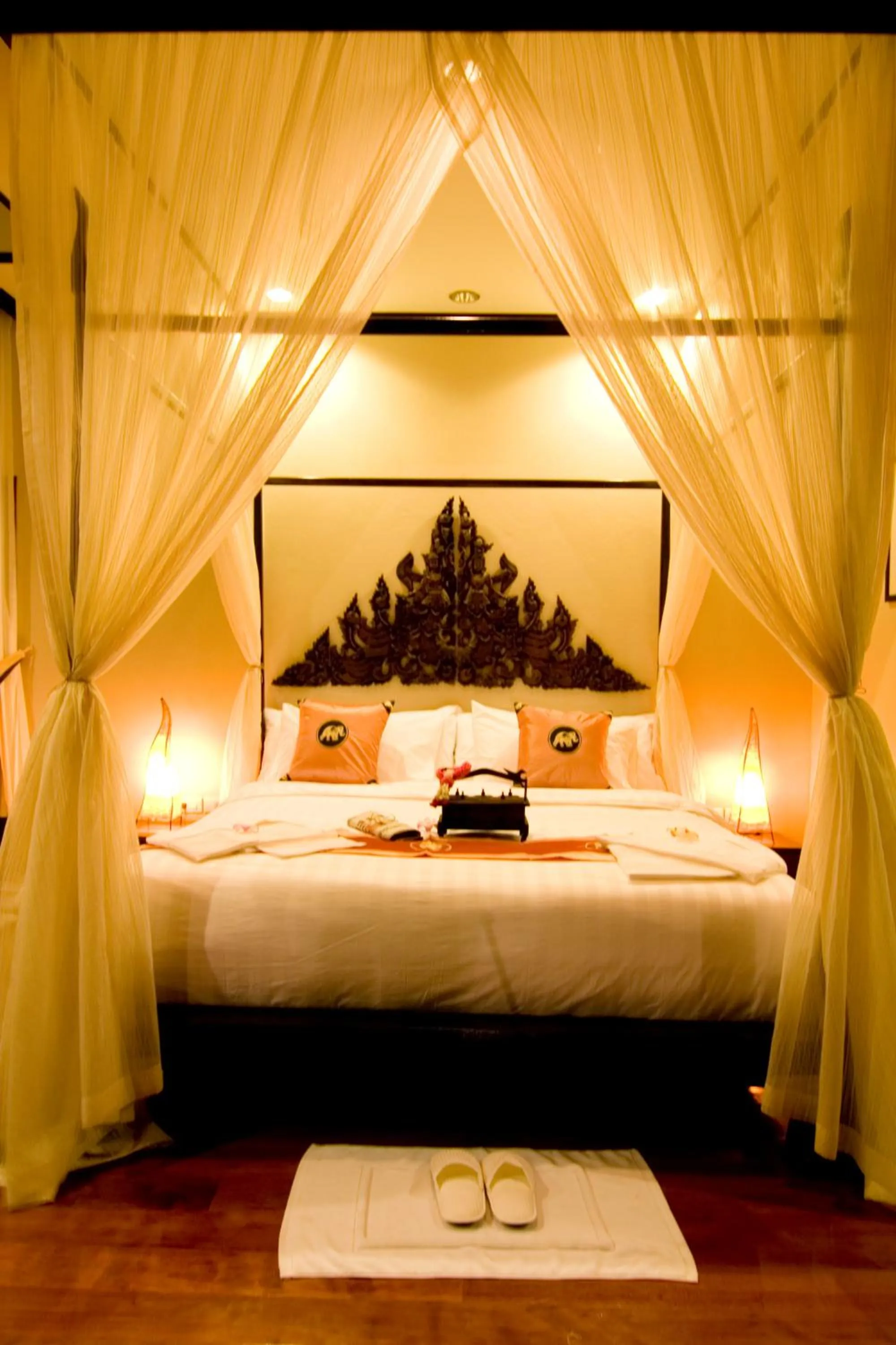 Bed in Kanok Buri Resort