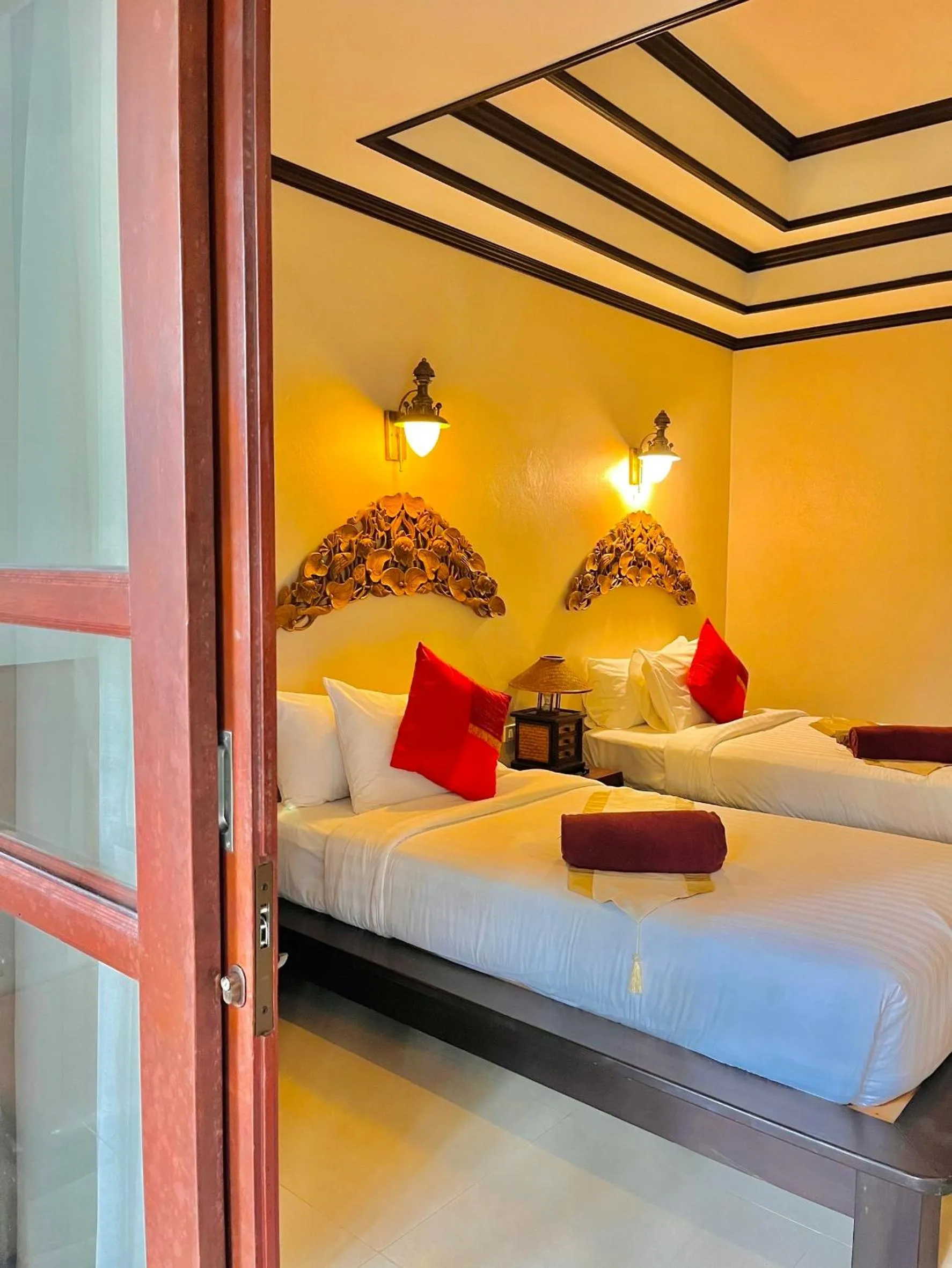 Bed in Kanok Buri Resort