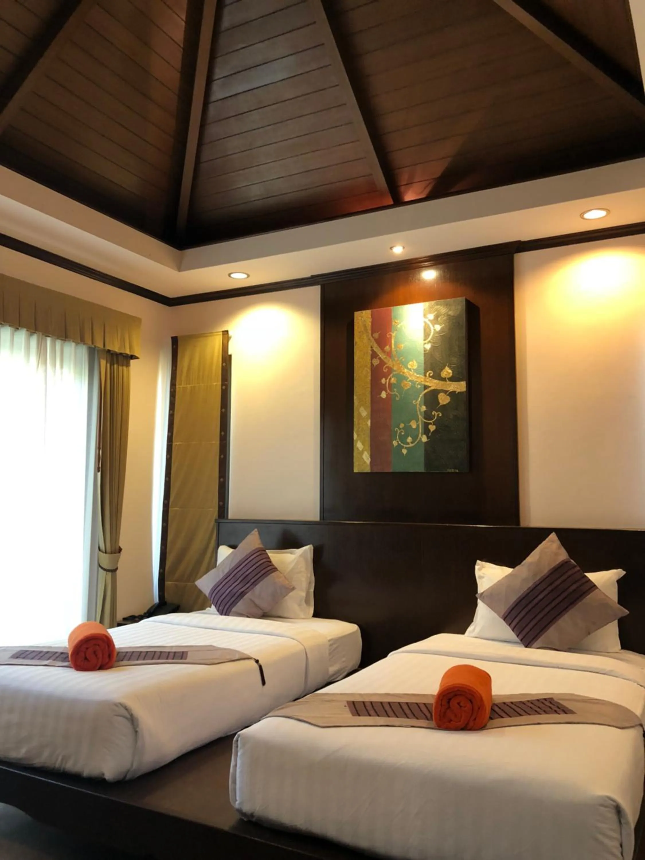 Photo of the whole room, Bed in Kanok Buri Resort