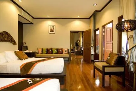 Bed in Kanok Buri Resort