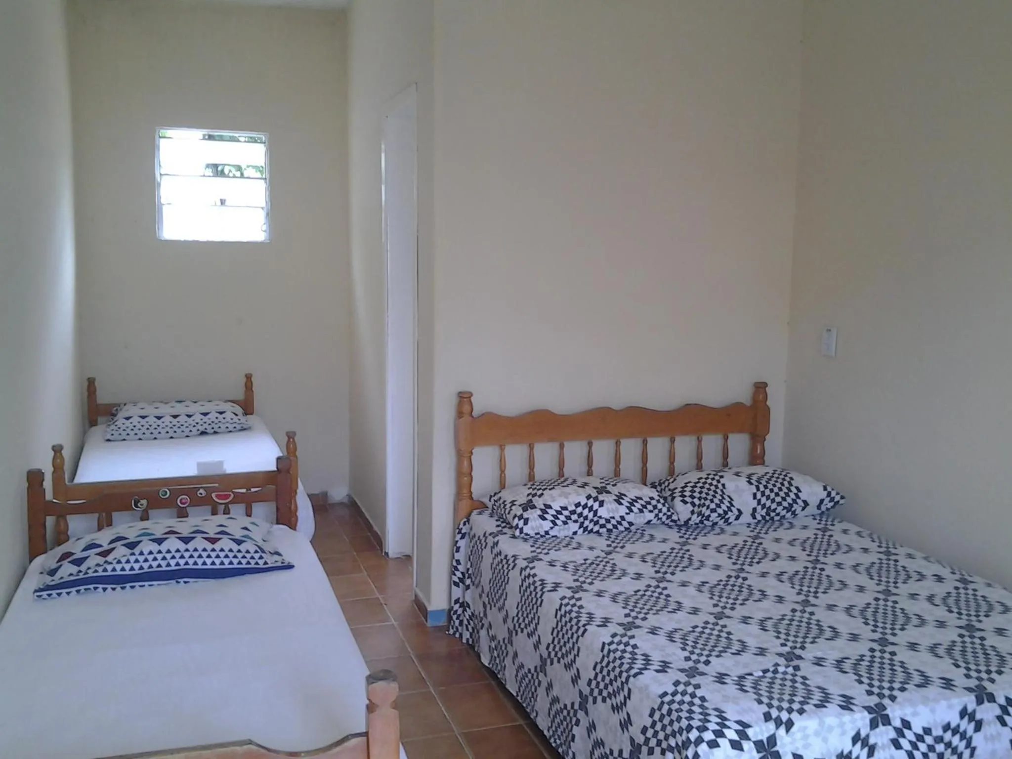 Photo of the whole room, Bed in Suítes Córdoba SP