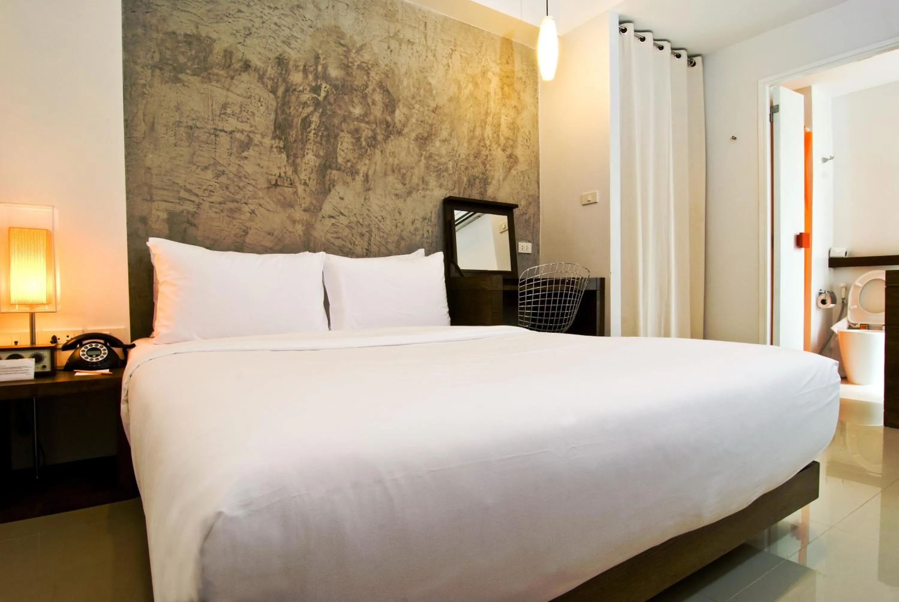 Bed in The Album Hotel