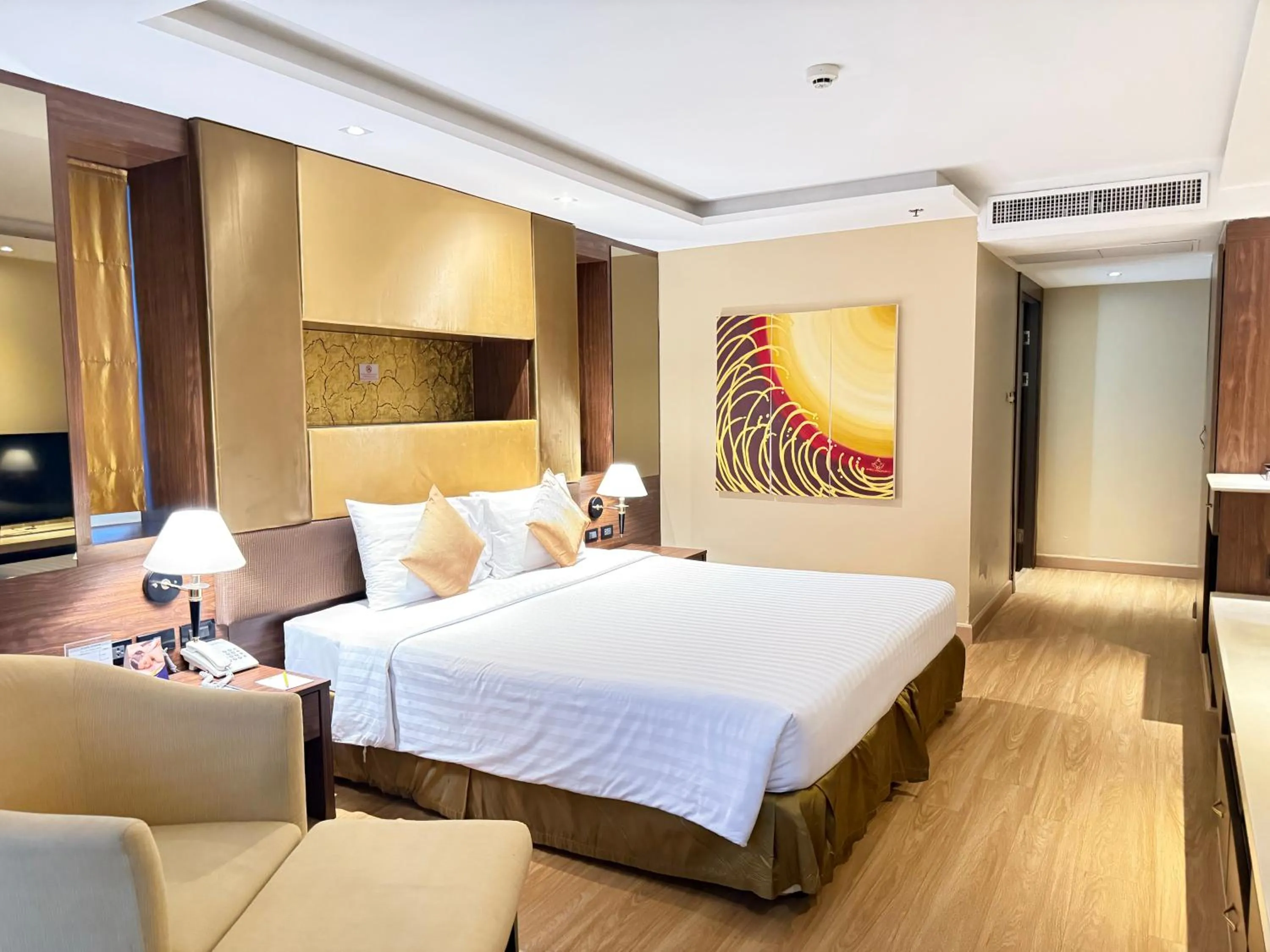 Bed in Nova Gold Hotel Pattaya