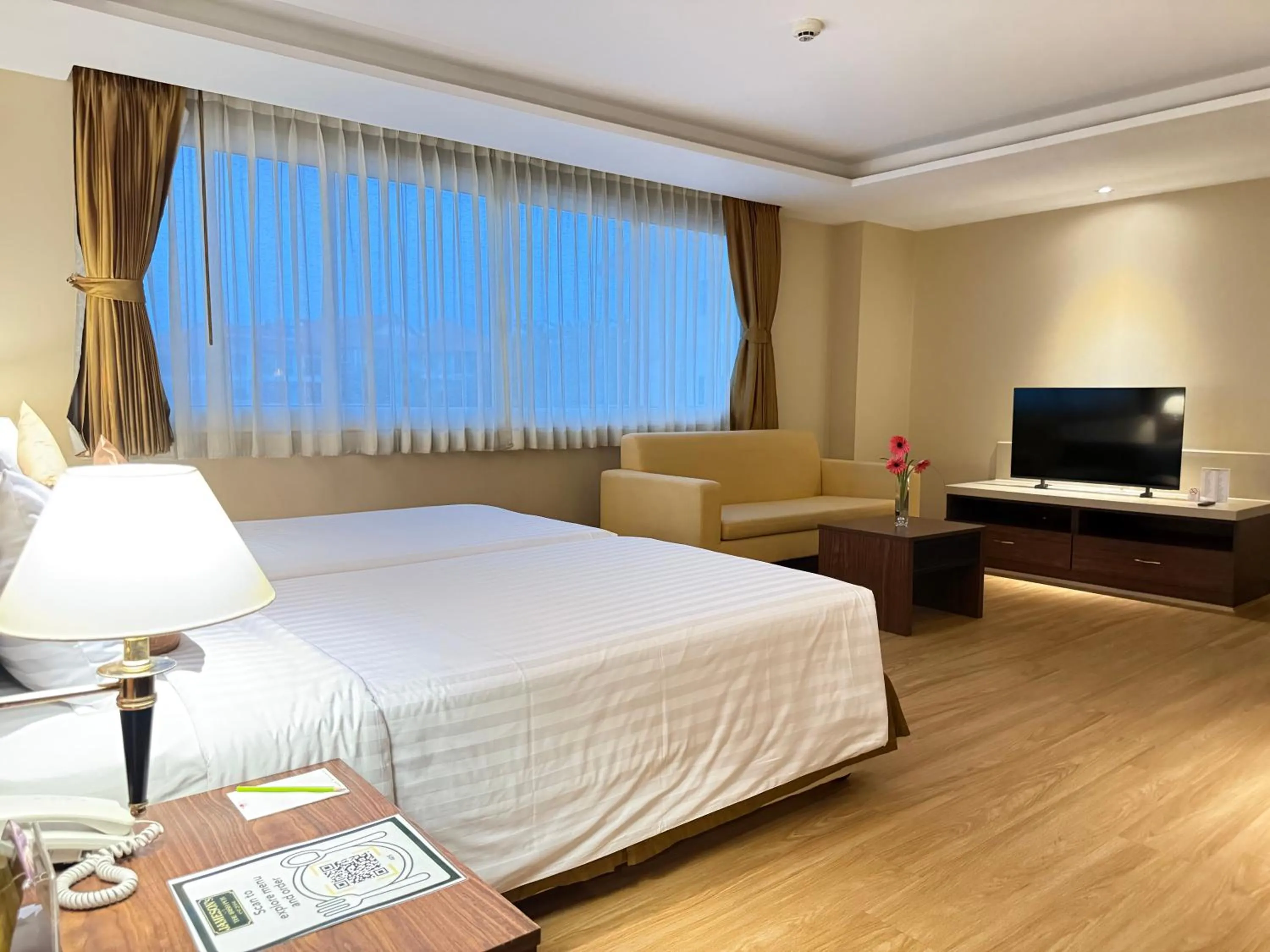 Bed in Nova Gold Hotel Pattaya
