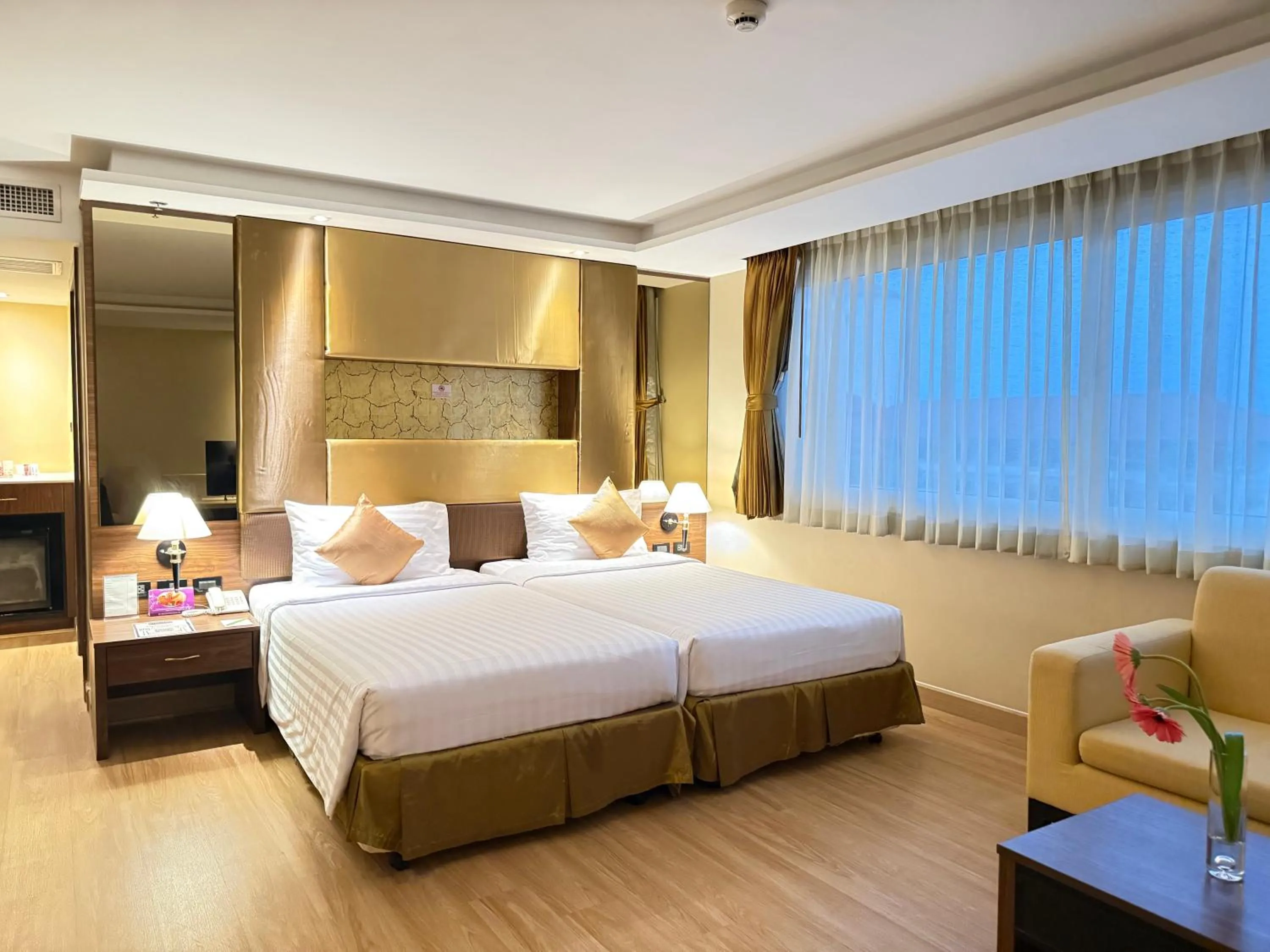 Bed in Nova Gold Hotel Pattaya