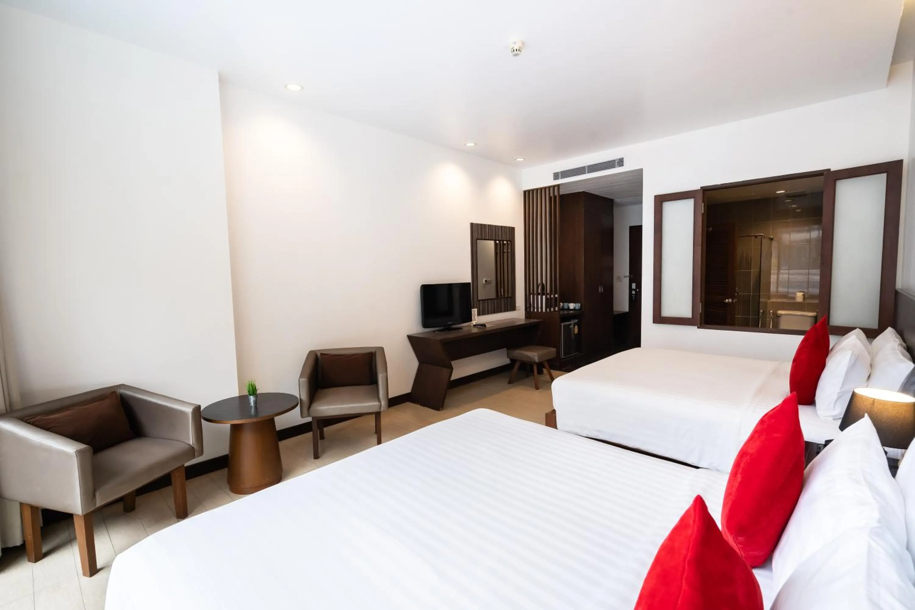 Bed in Hotel J Pattaya