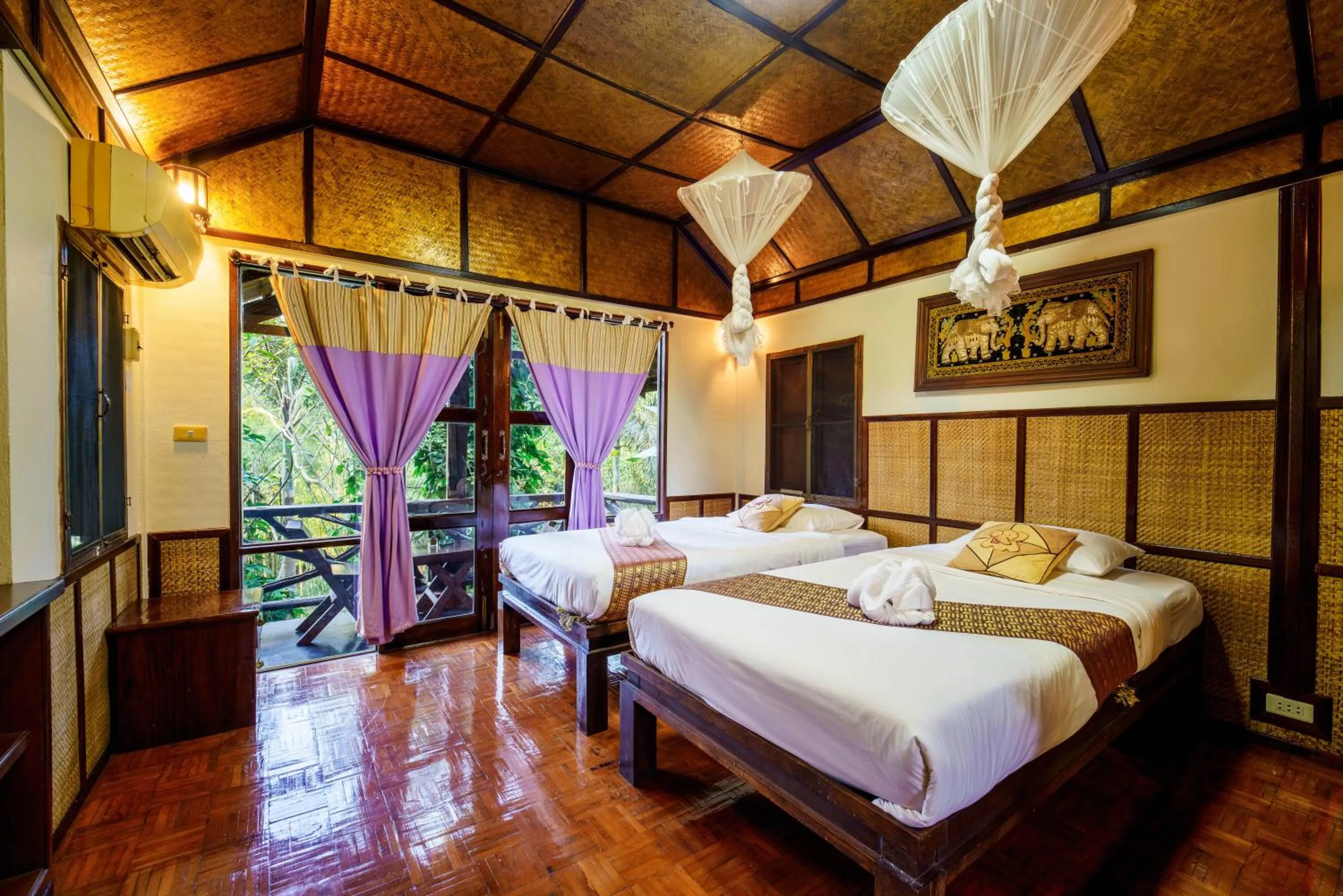 Bed in Marisa Resort & Spa Chiang Dao