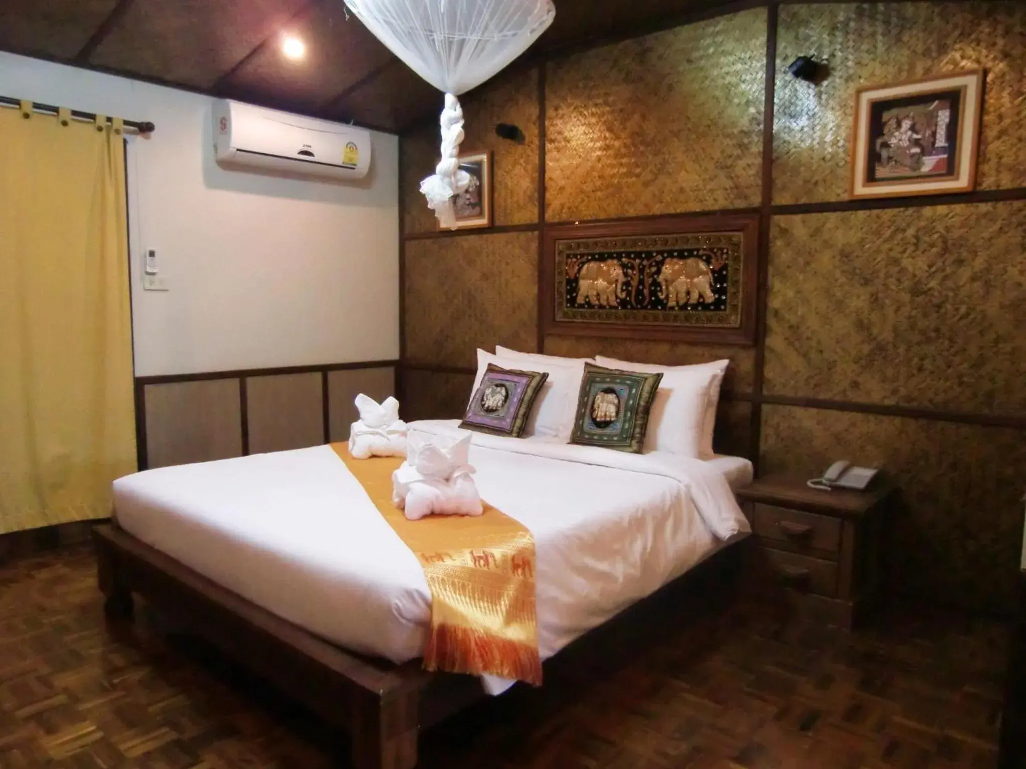 Bed in Marisa Resort & Spa Chiang Dao Bed in Marisa Resort & Spa Chiang Dao