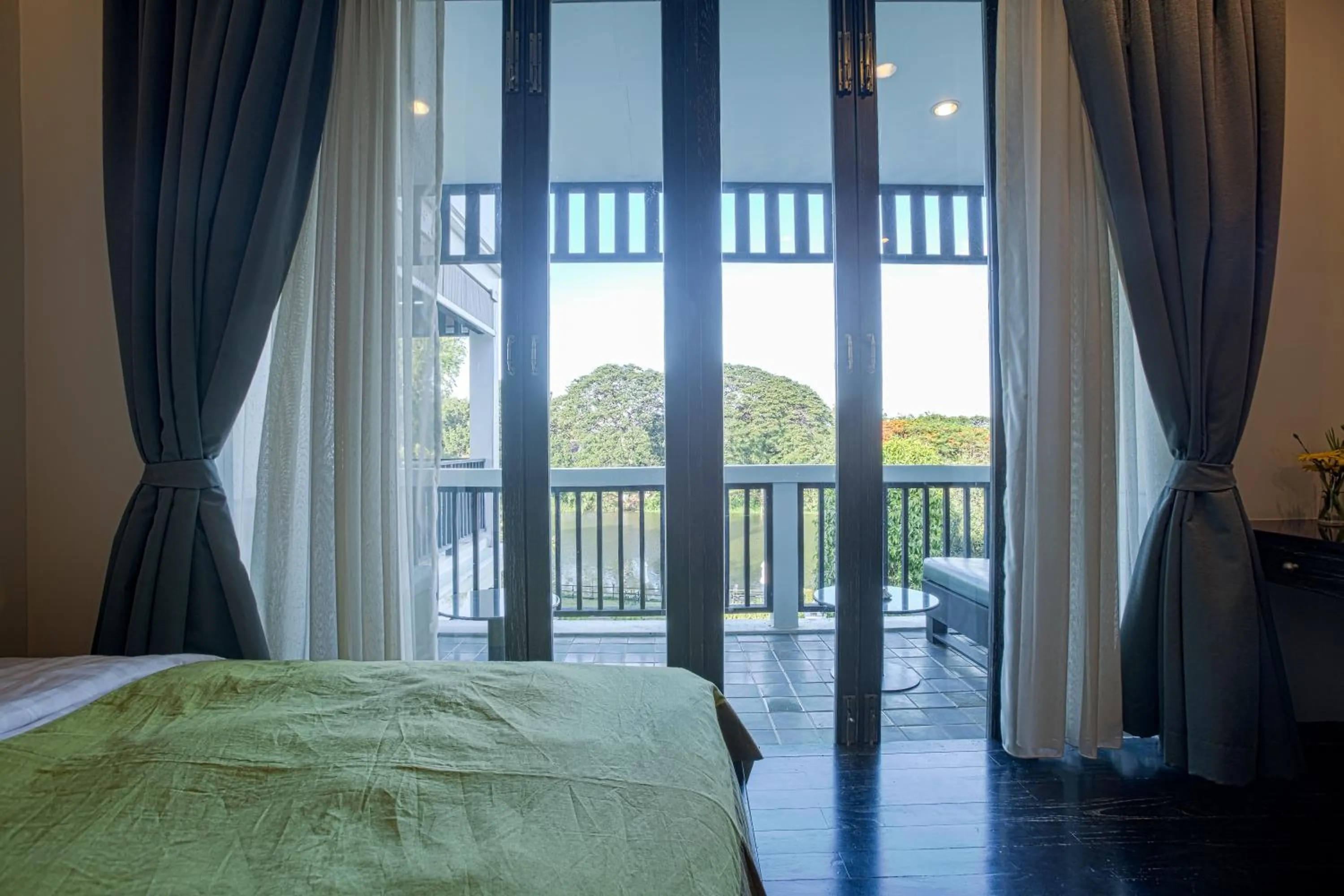 Bed in Aruntara Riverside Boutique Hotel