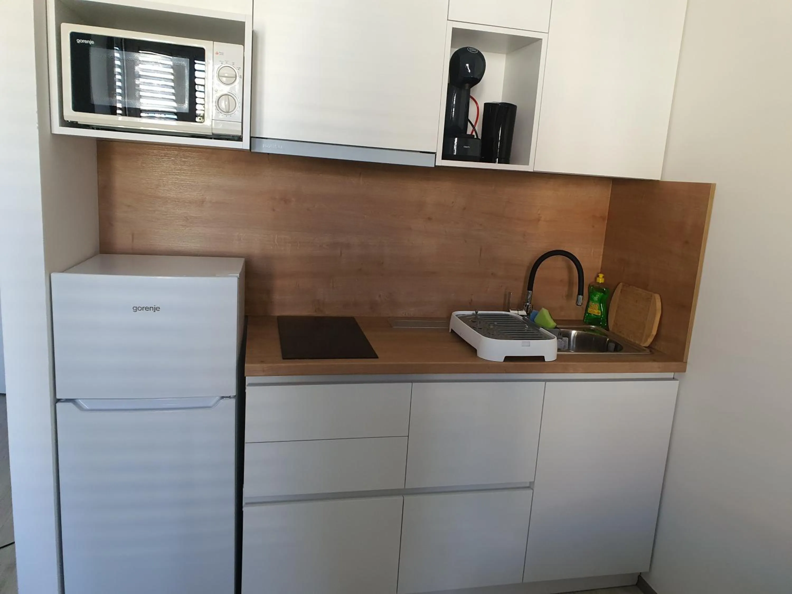 Kitchen or kitchenette in Pavelin apartments