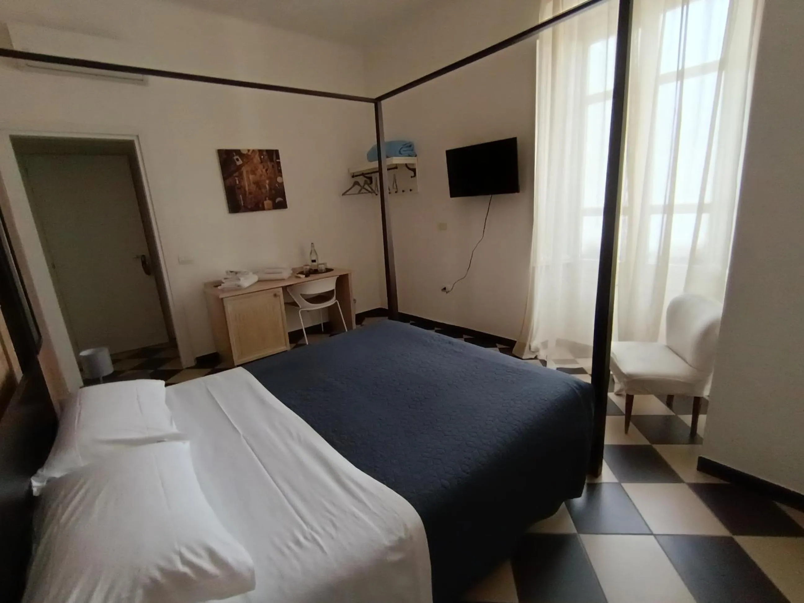Bed in Manì Rooms