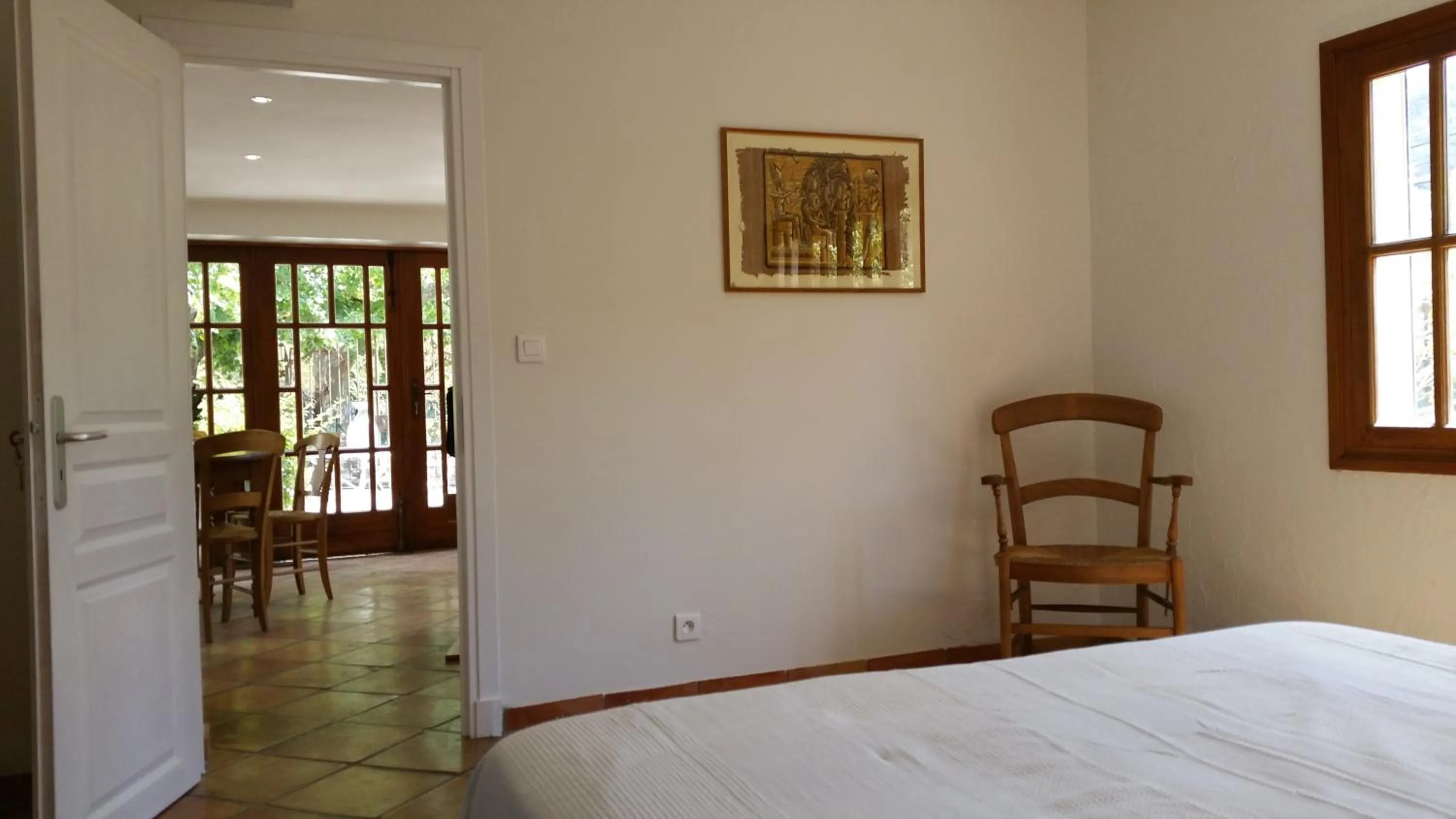 Seating area, Bed in Le Clos du Loup