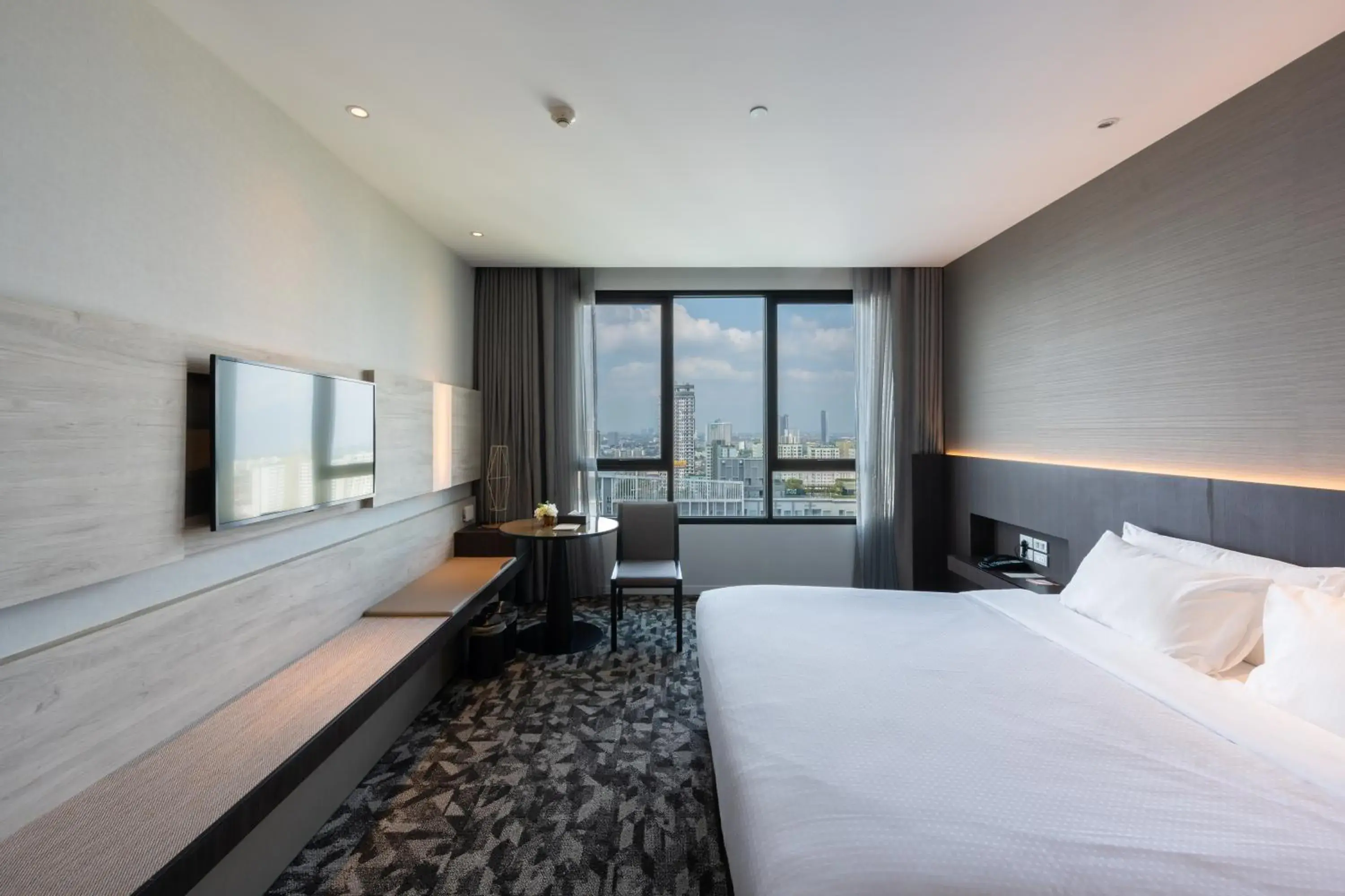 Bed in Grand Richmond Stylish Convention Hotel Bed in Grand Richmond Stylish Convention Hotel