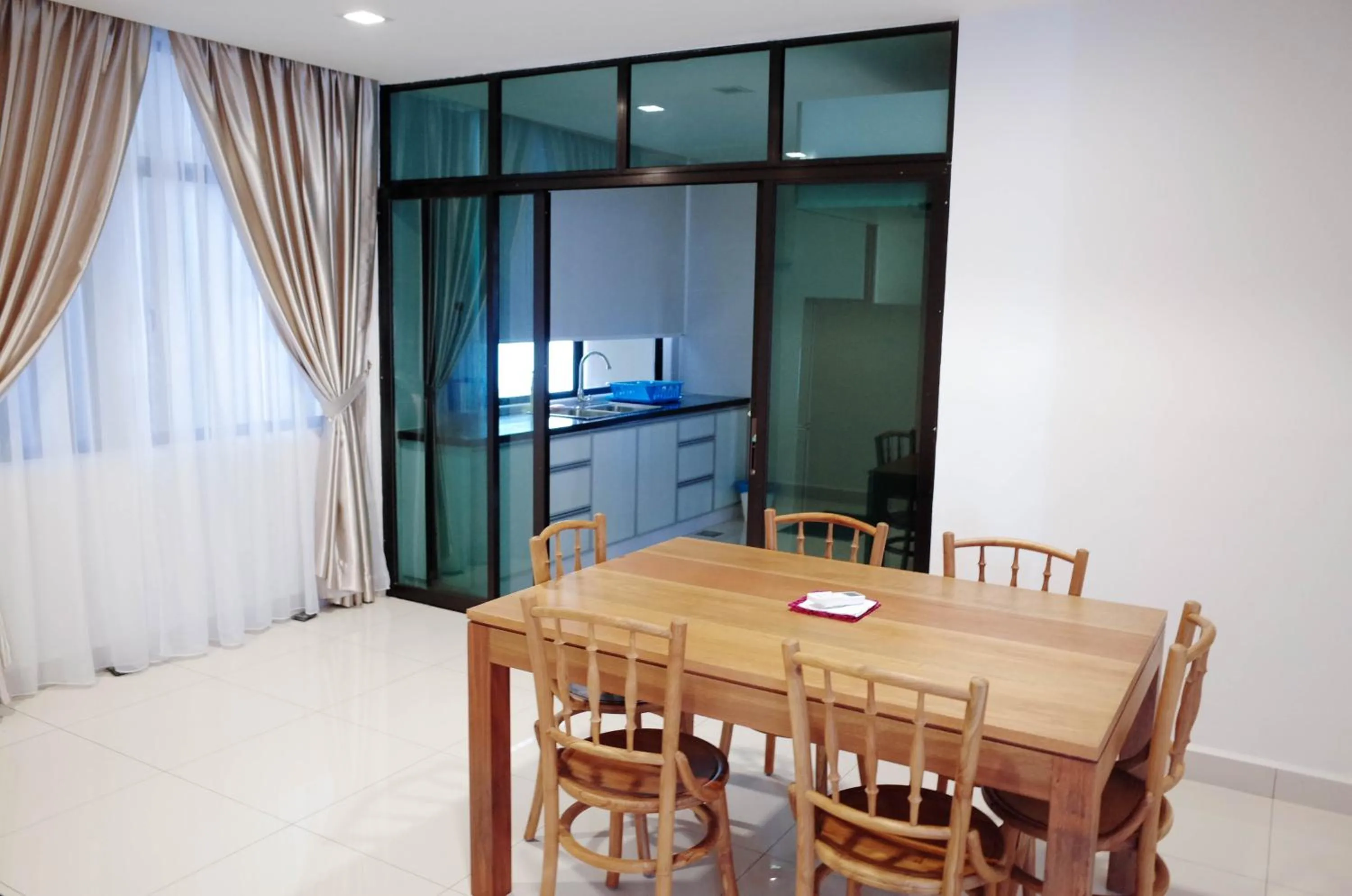 Dining area in Holiday Homes At Samsuria Resort