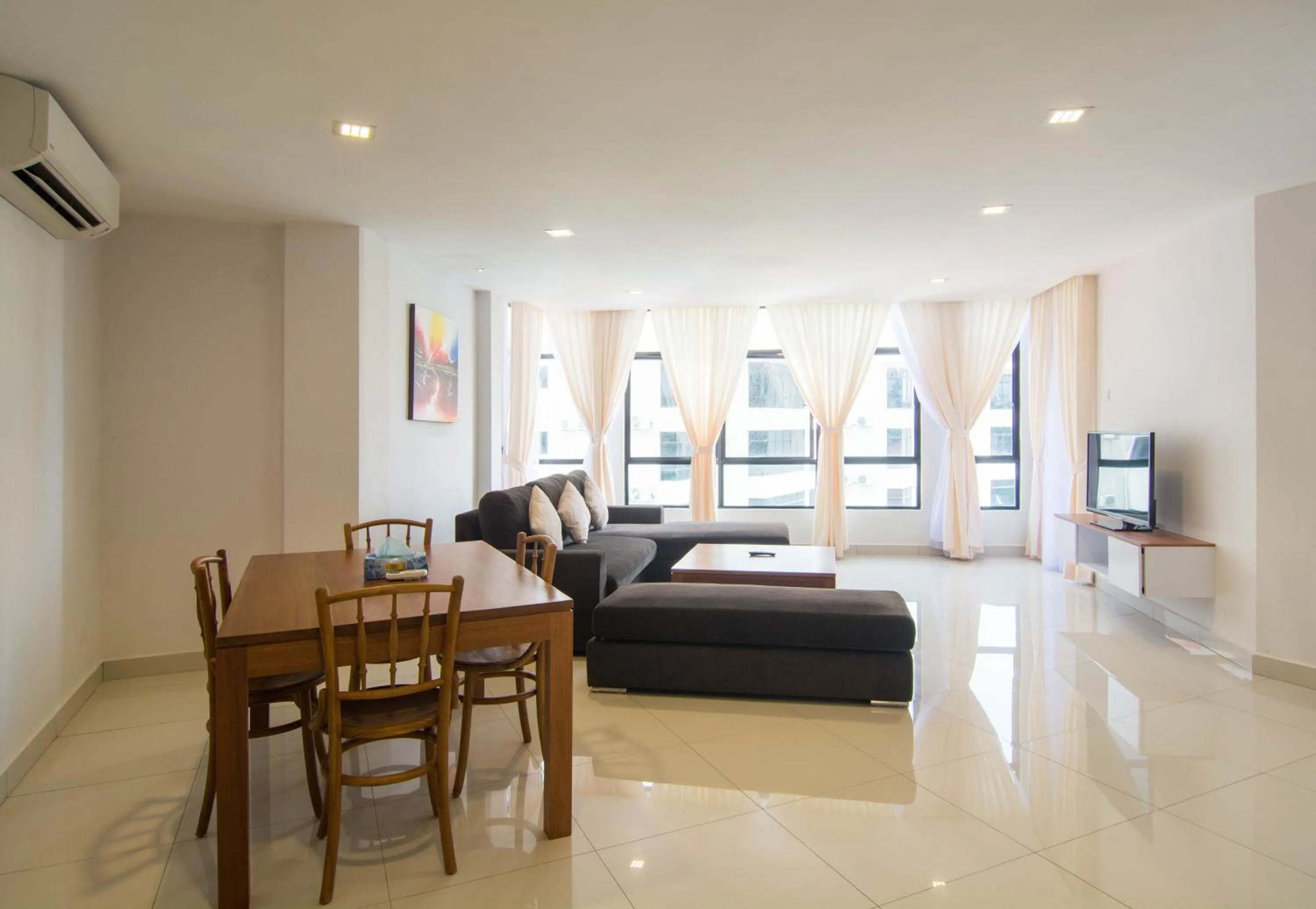 Living room in Holiday Homes At Samsuria Resort