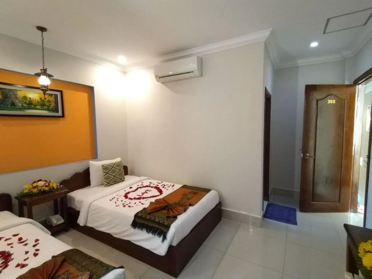 Bedroom in Plumeria Hotel & Spa