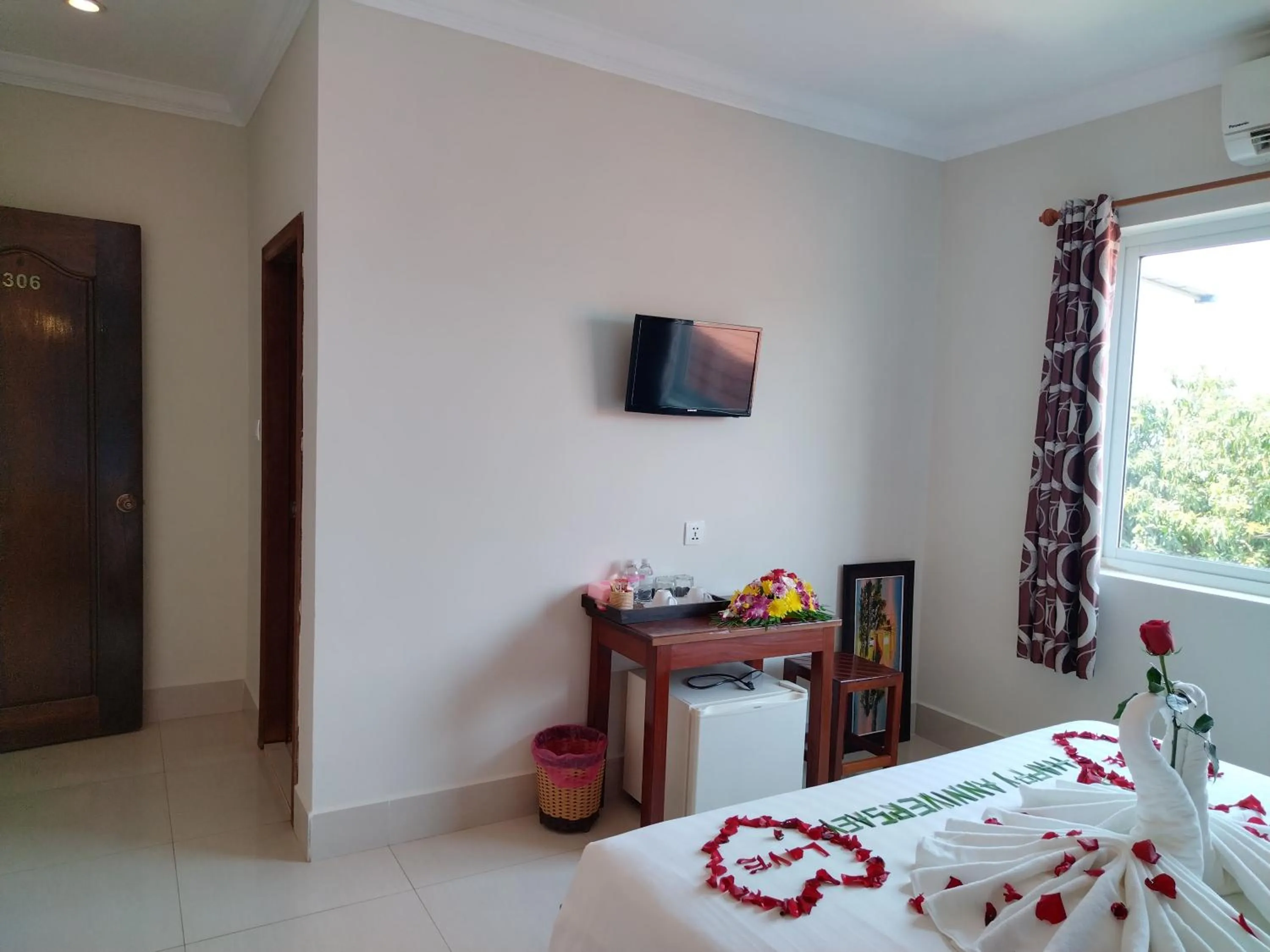 Bed in Plumeria Hotel & Spa