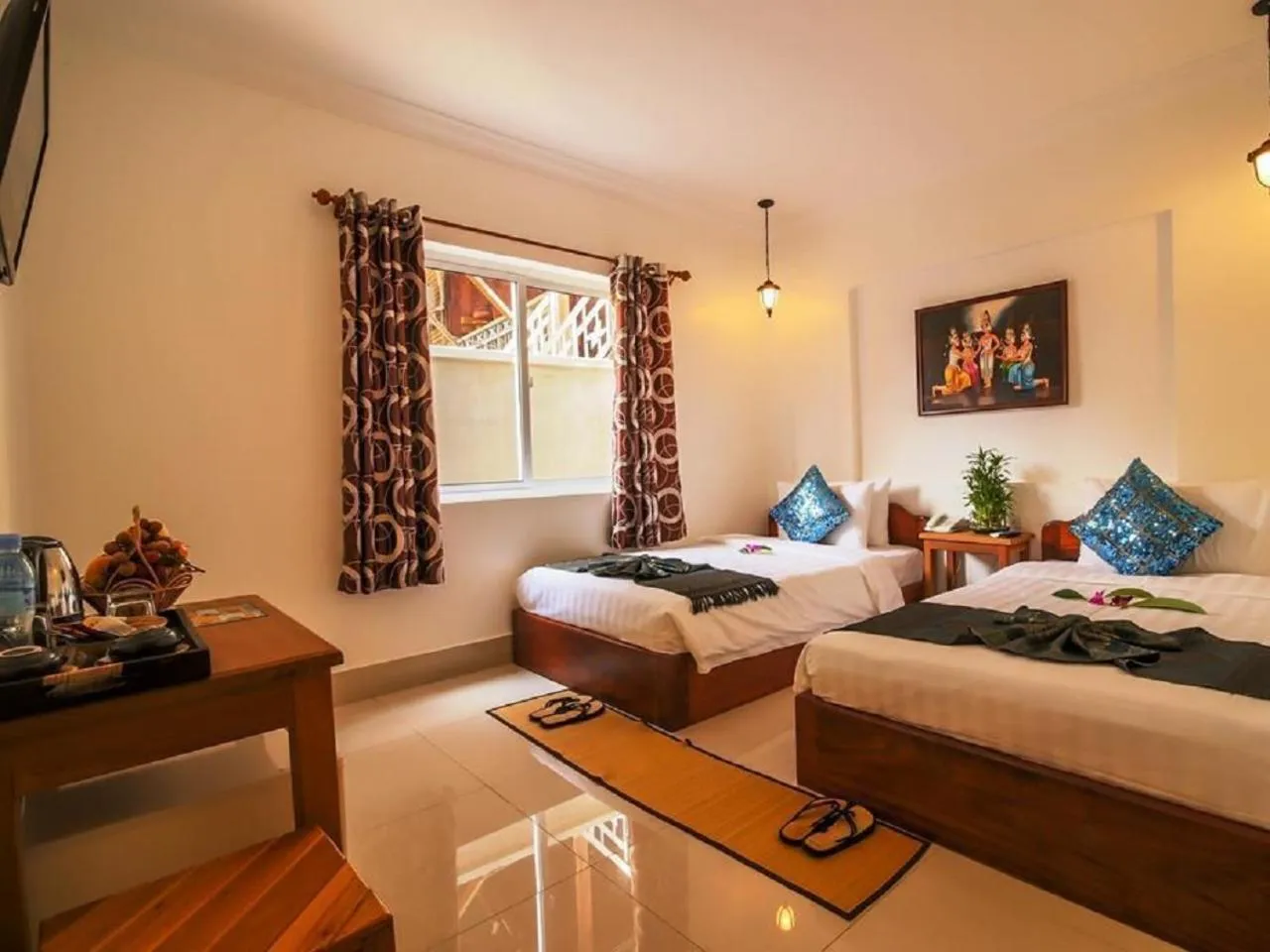 Bedroom in Plumeria Hotel & Spa