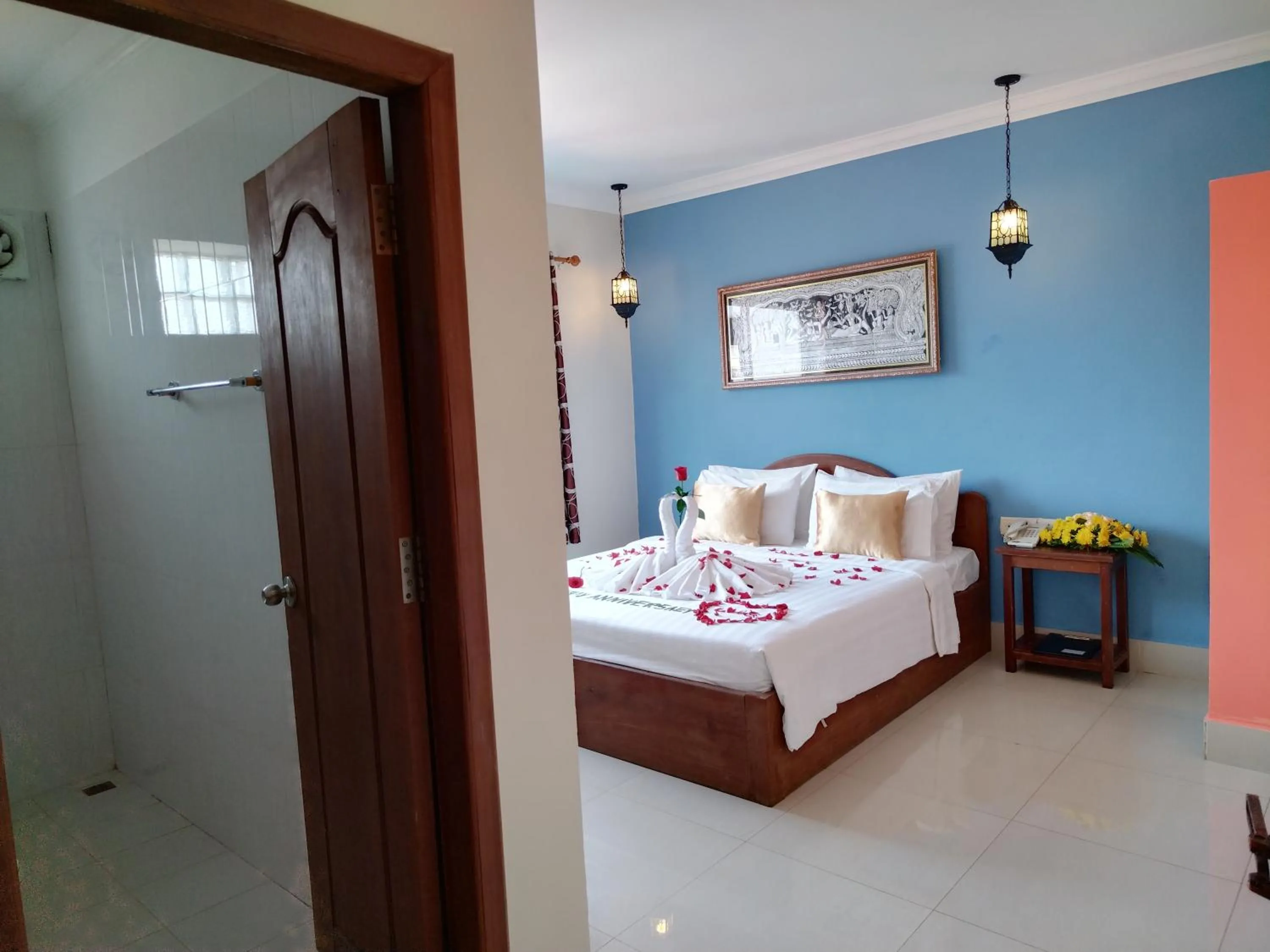 Bedroom in Plumeria Hotel & Spa