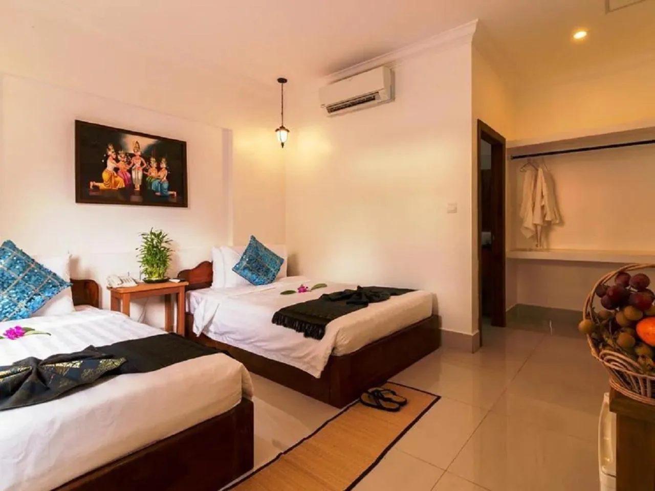 Bedroom in Plumeria Hotel & Spa