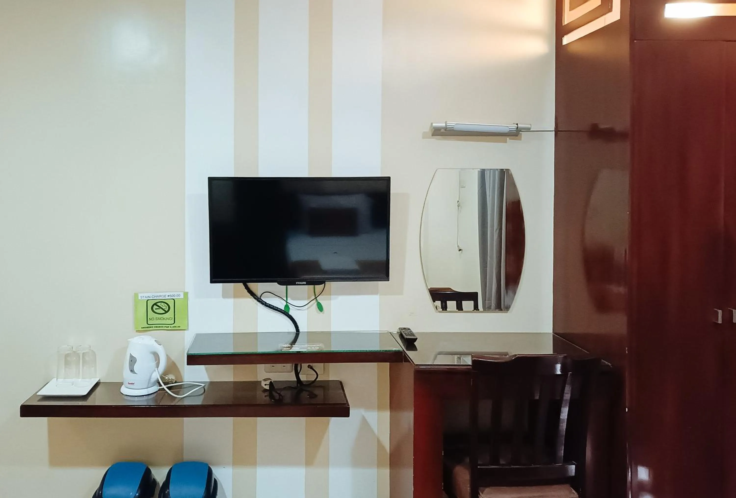 TV and multimedia in Hotel Juliana by RedDoorz