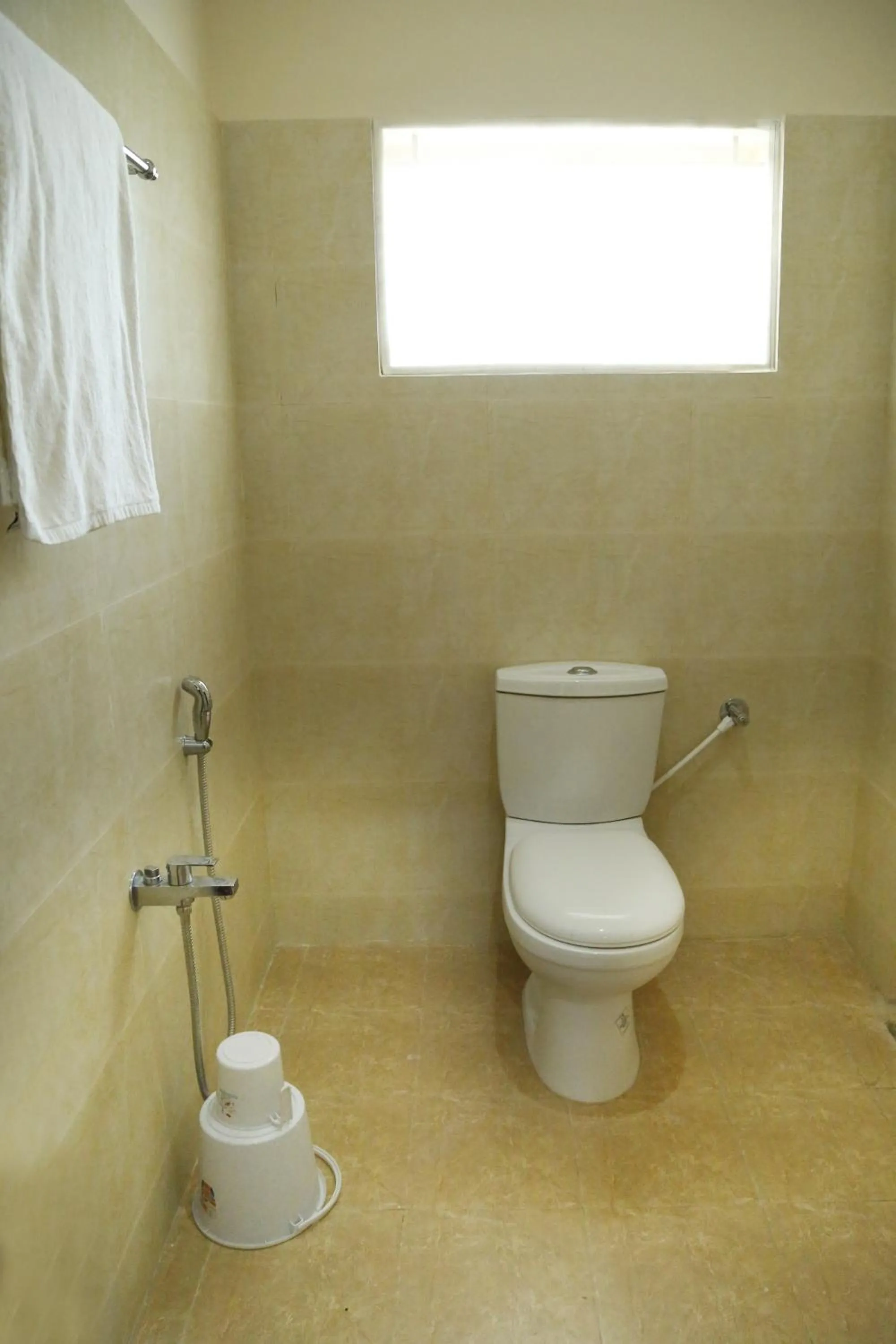 Bathroom in Hotel New Amirtham inn