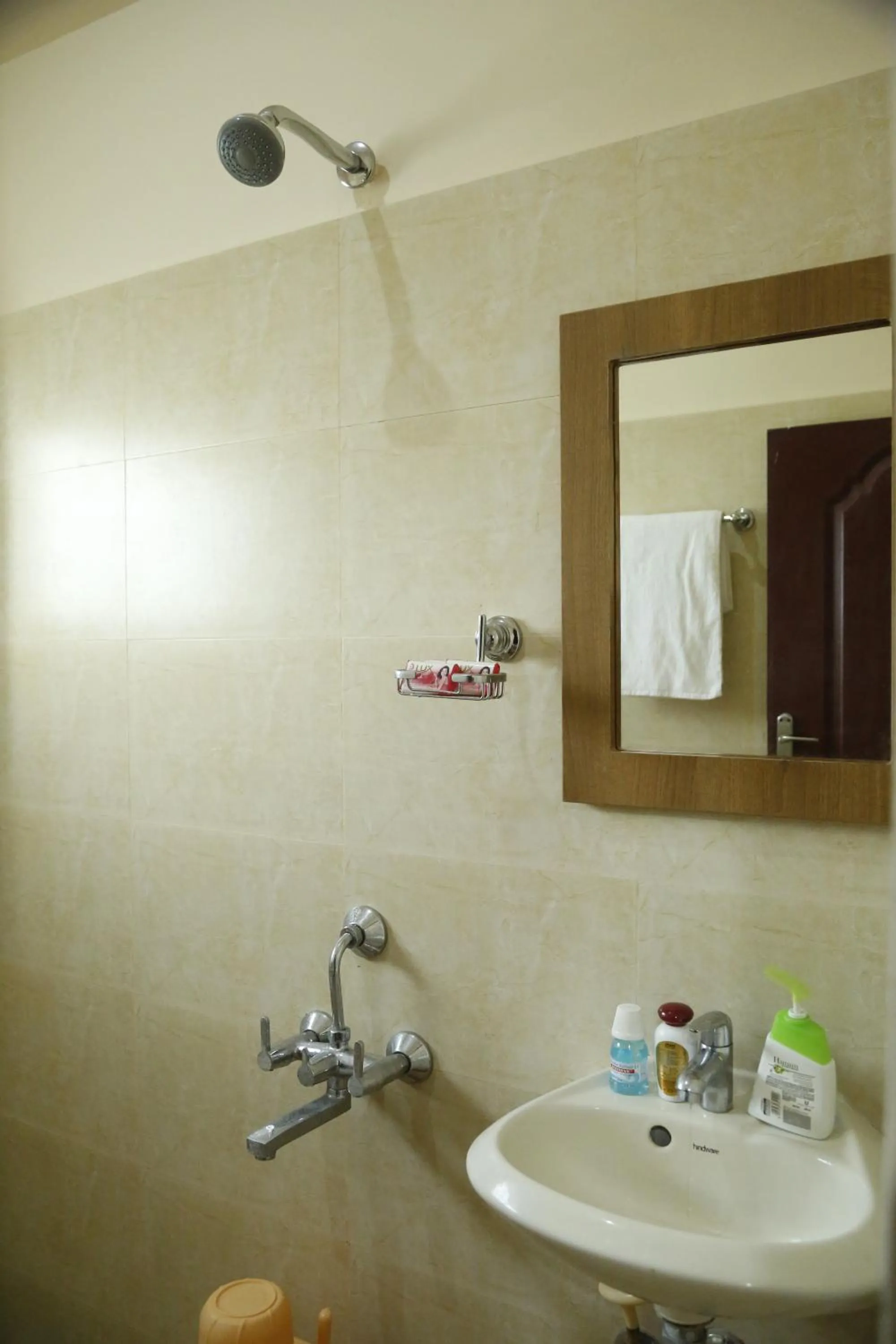 Bathroom in Hotel New Amirtham inn