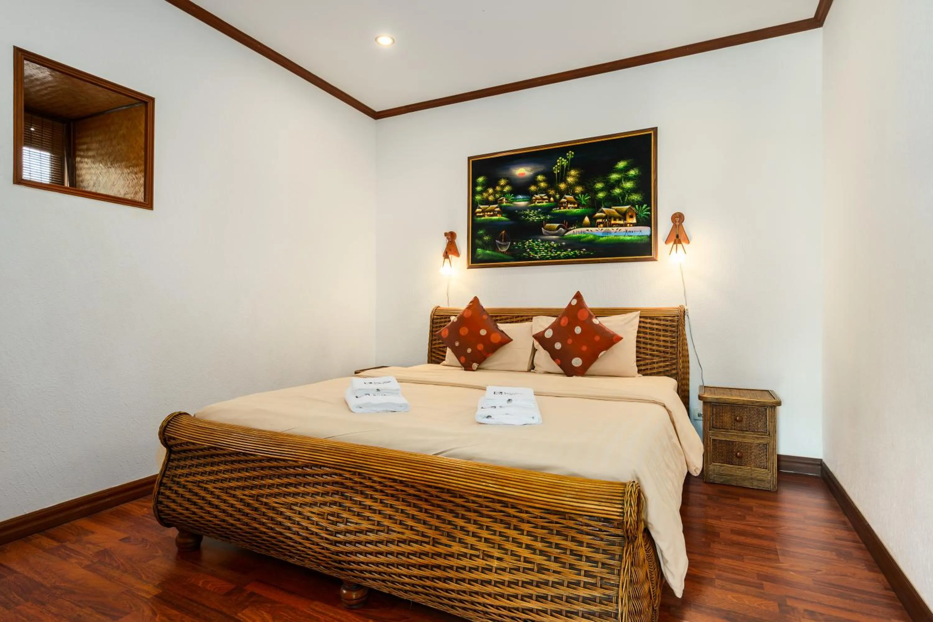 Bed in Royal Cottage Residence