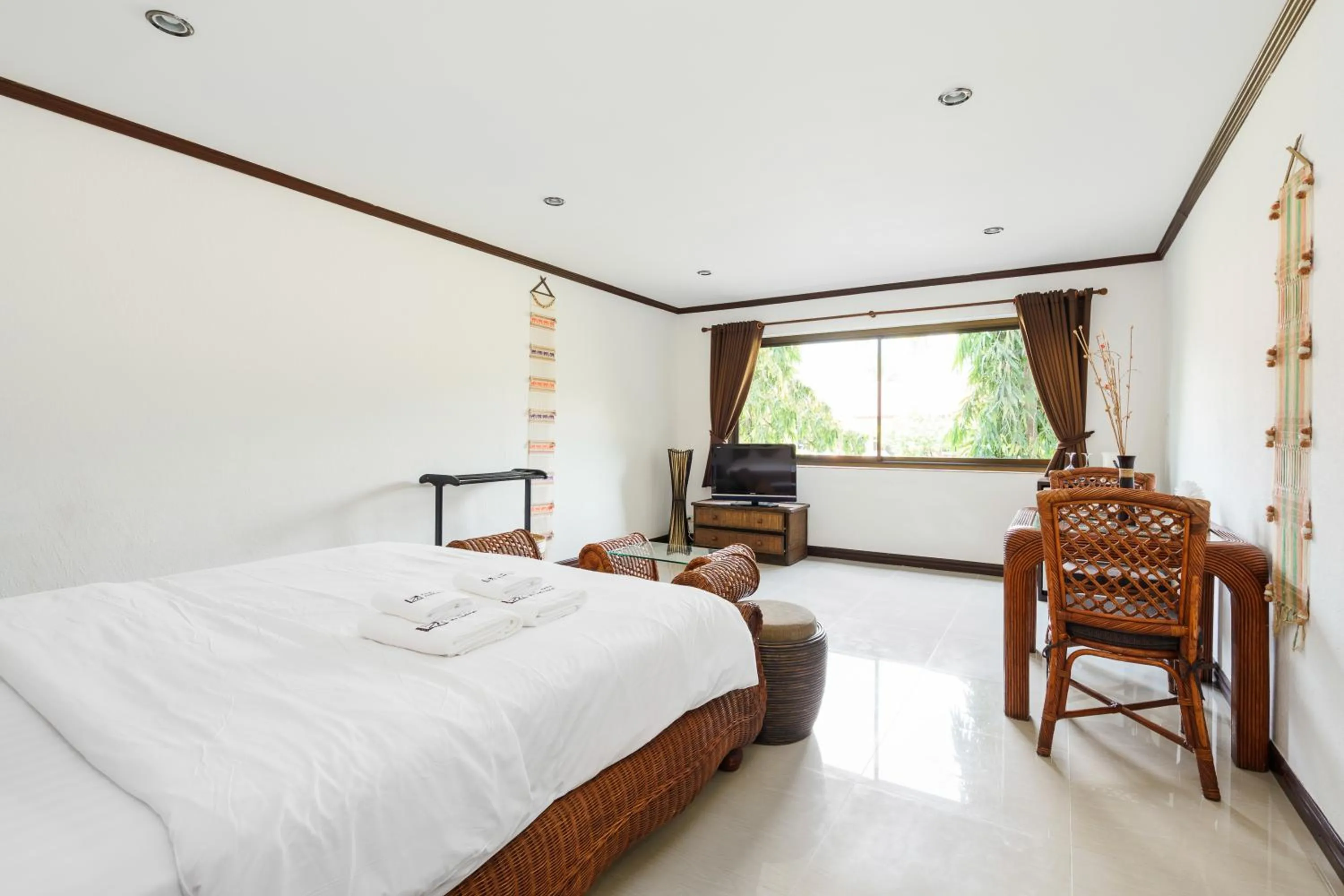 Bed in Royal Cottage Residence