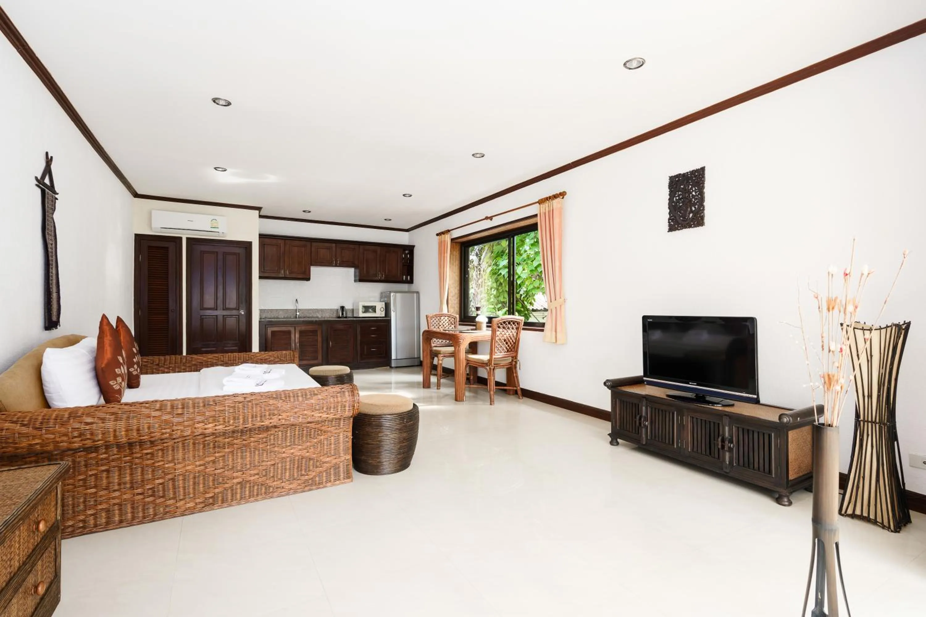 Bed in Royal Cottage Residence