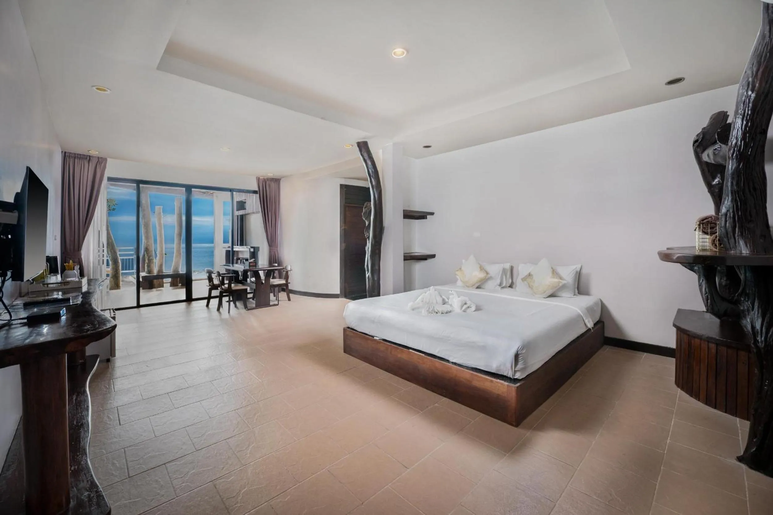 Photo of the whole room, Bed in Dusit Buncha Koh Tao by Riya Group