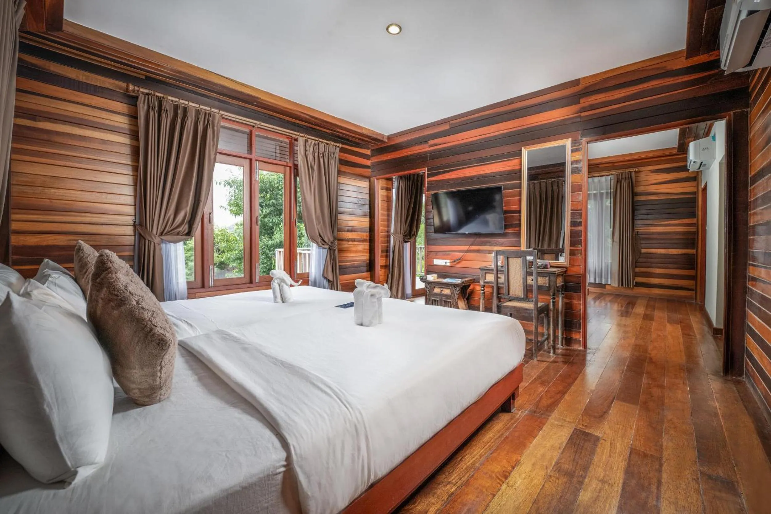 Photo of the whole room, Bed in Dusit Buncha Koh Tao by Riya Group