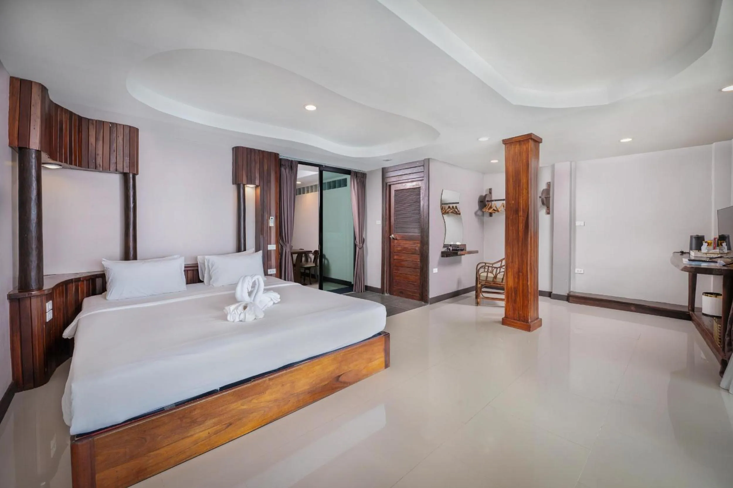 Photo of the whole room, Bed in Dusit Buncha Koh Tao by Riya Group