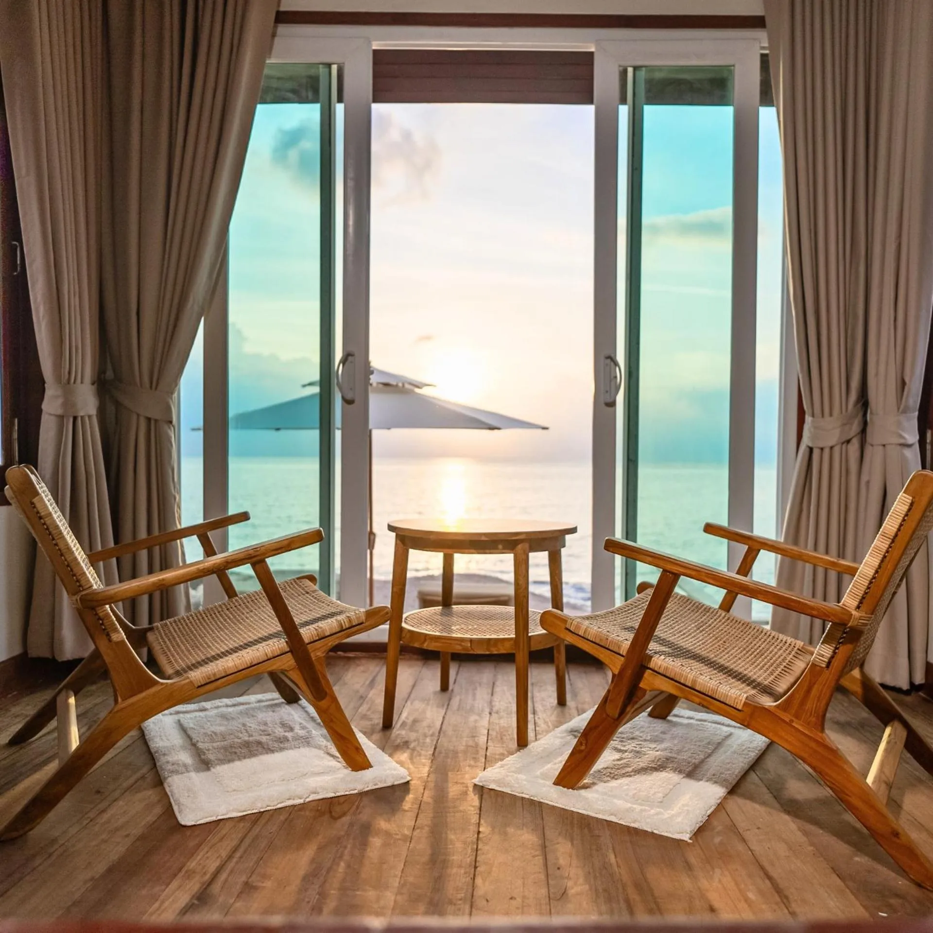 Living room in Dusit Buncha Koh Tao by Riya Group